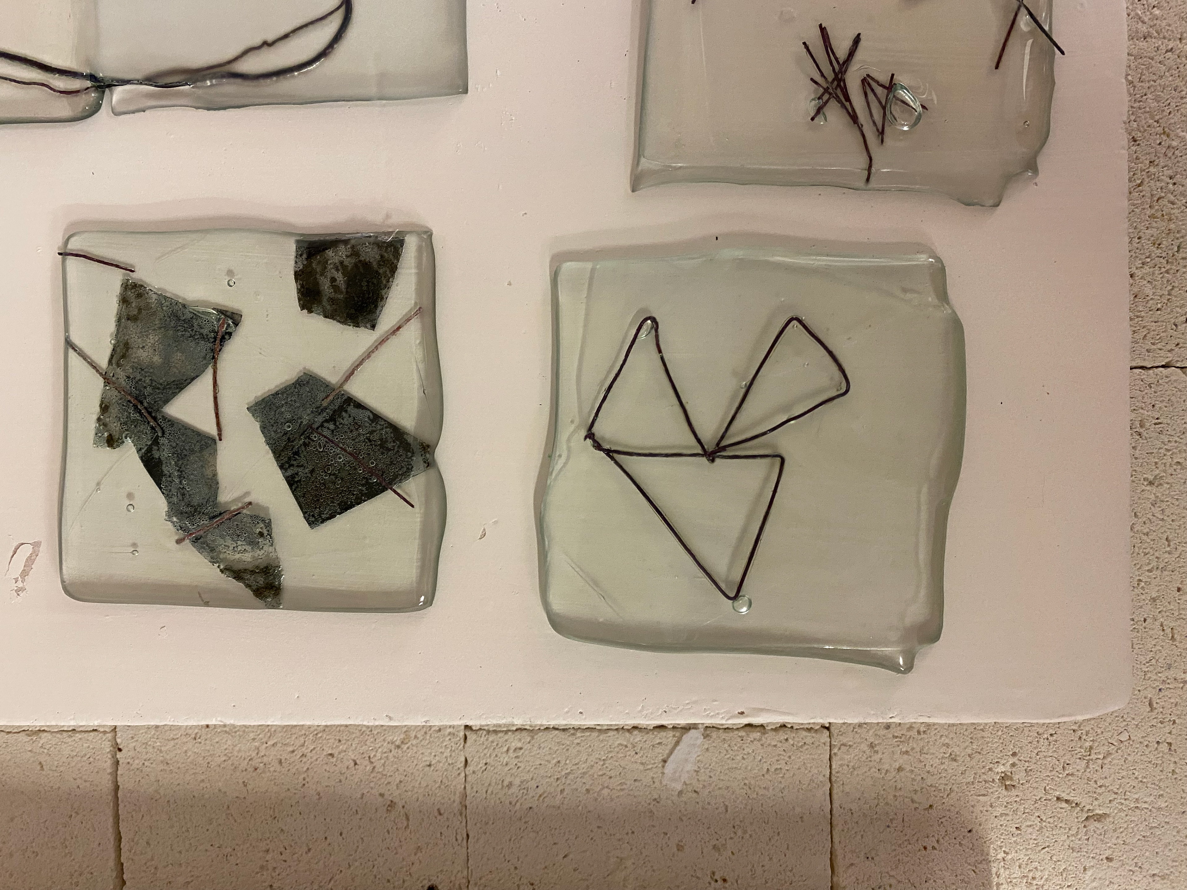 Results of glass tiles after being in the kiln on full fuse