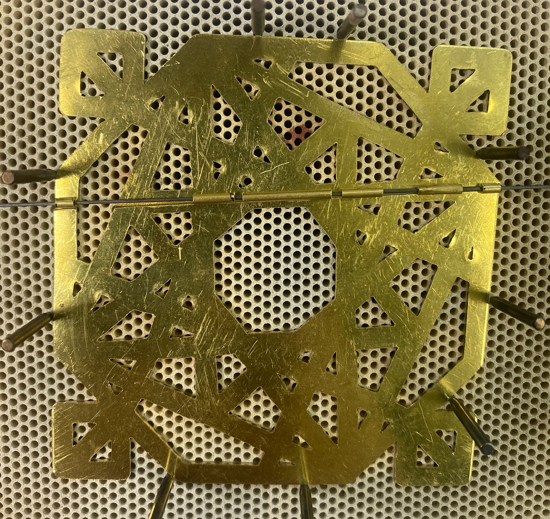Hinges put in place to solder