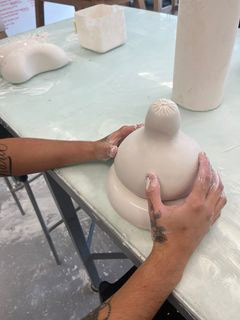 Shaping the second piece using the first.