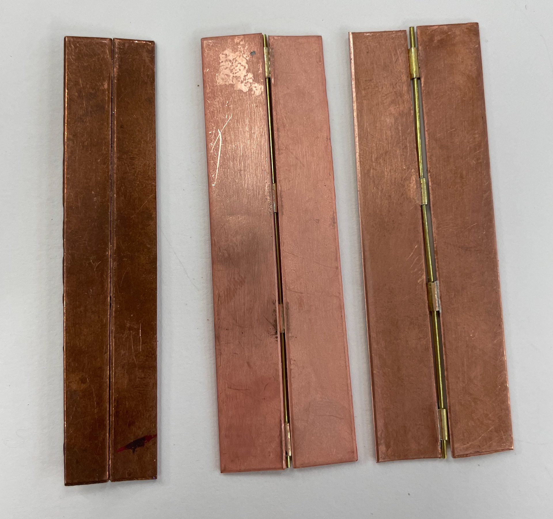 Backs of different hinges placed in different positions