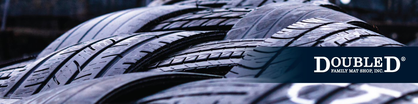 Banner image of Double D Mat Shop logo overlaid over tires by Custer Creative