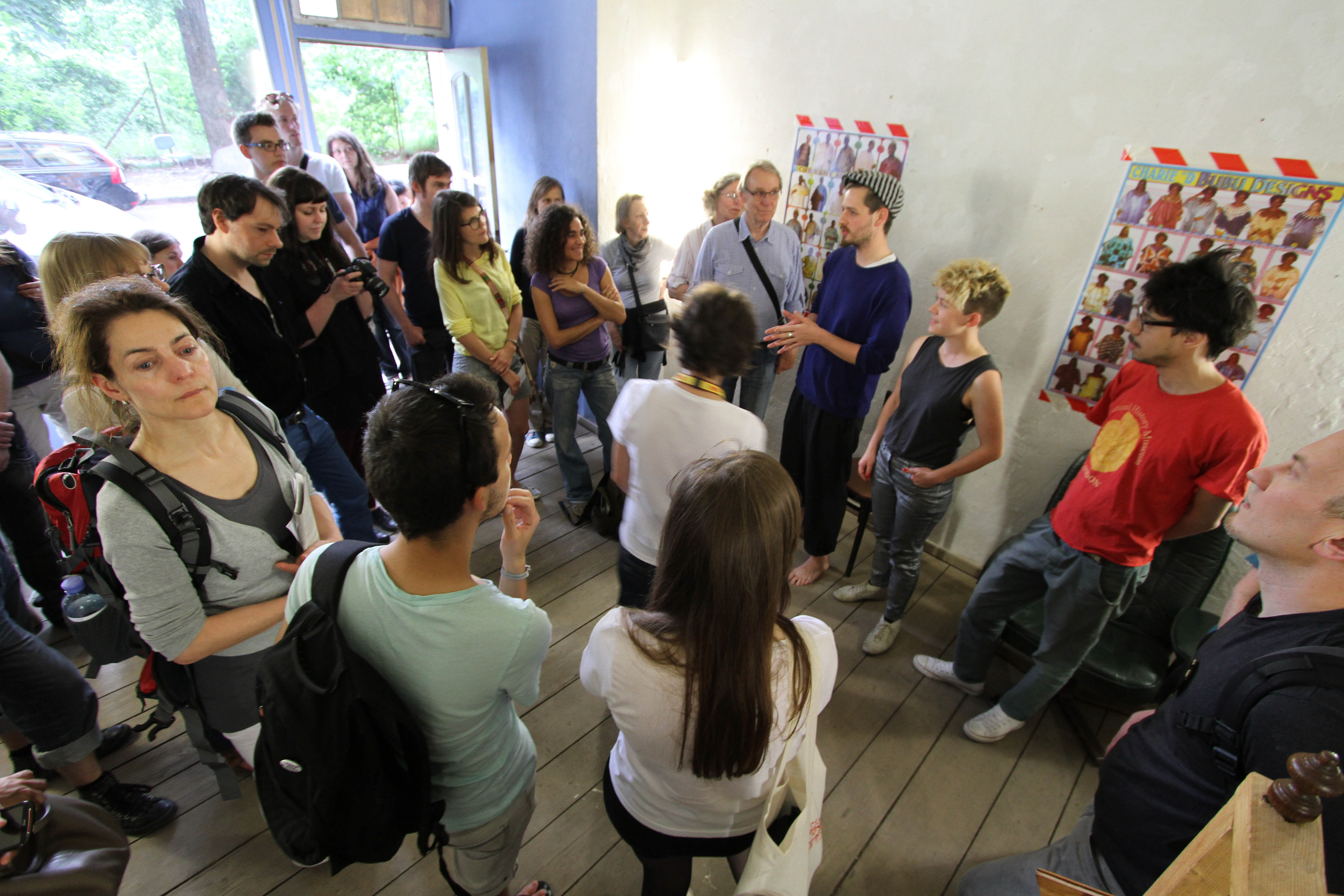 Photographic documentation from the project "Weaving the Social Fabric", by Meyrick Kaminski. Demonstration of the weaving loom and presentation, Berlin, June 2013.