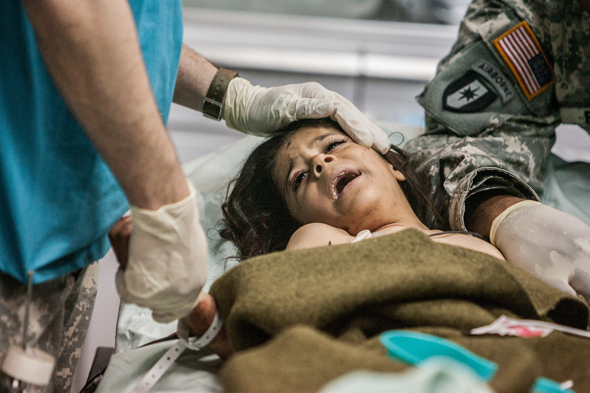 A young Iraqi girl in one of the trauma rooms at the 28th Combat Support Hospital.