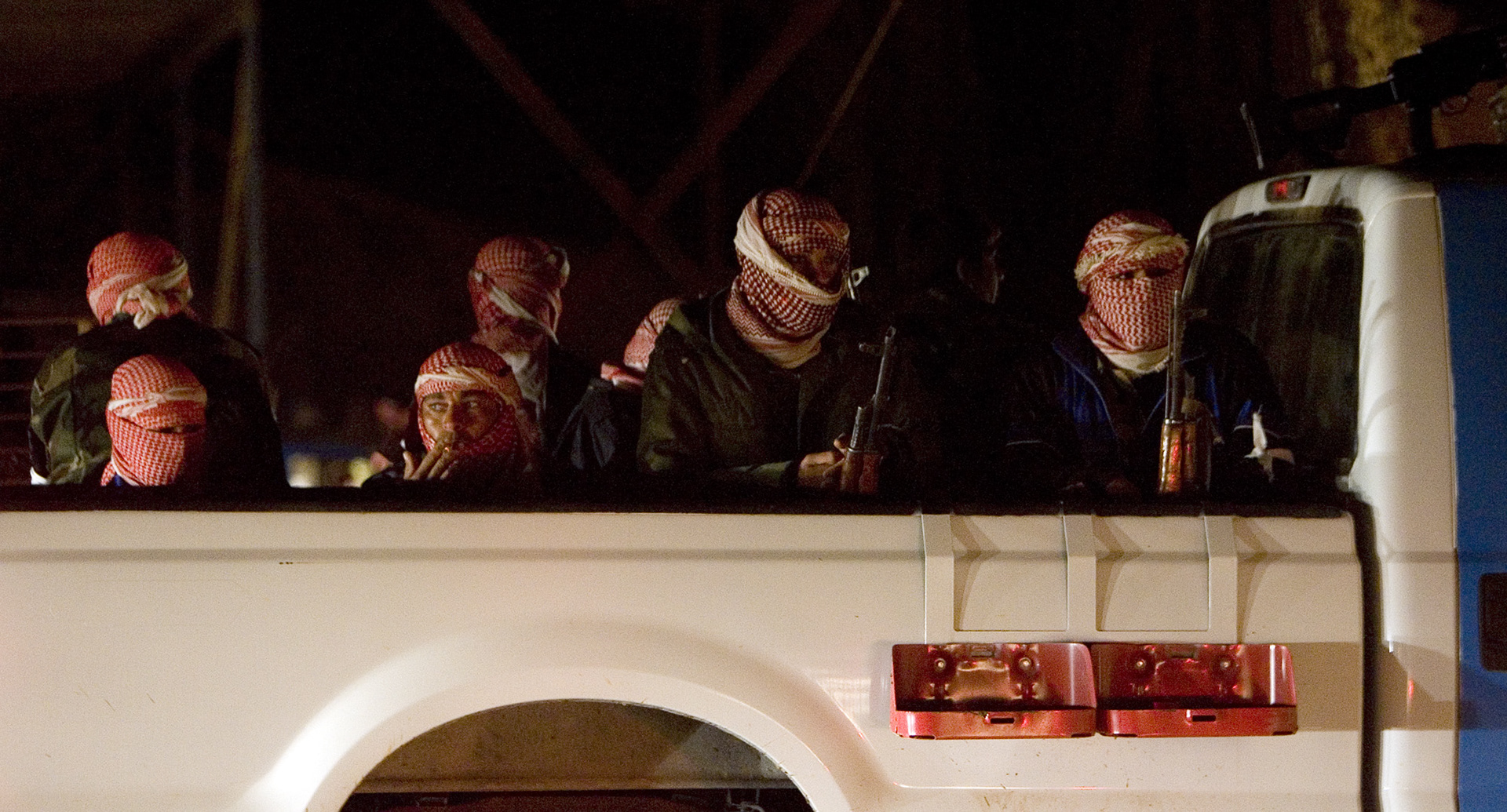 Iraq police leaving before dawn on an  assault mission to clear an area of insurgents south of Tameem known as al-Tash, near Ramadi.