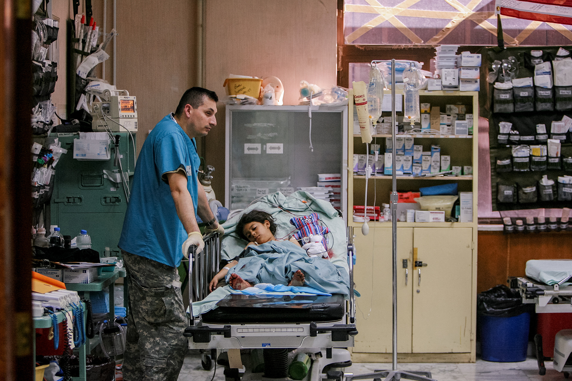 A young girl in one of the trauma rooms at the 28th Combat Support Hospital.