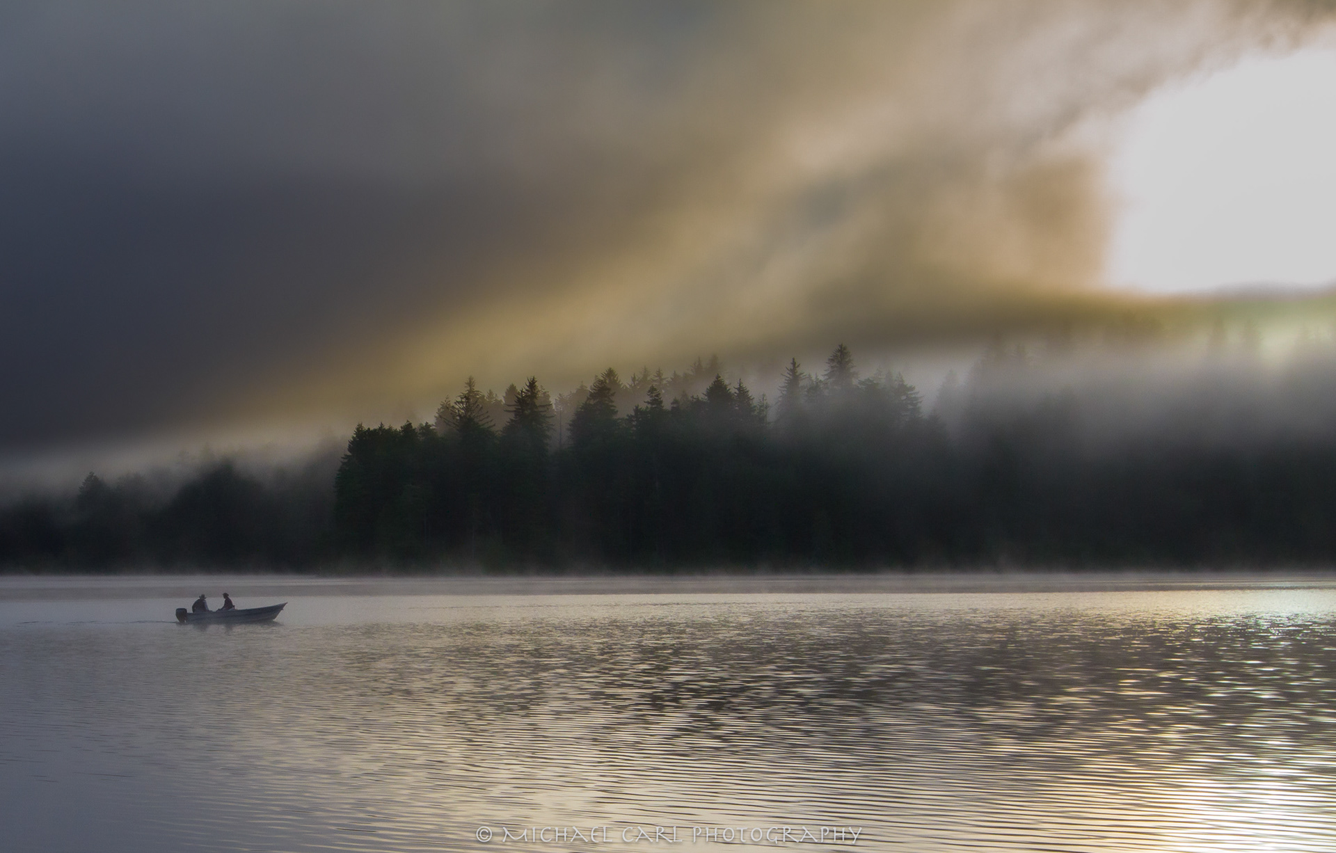 Foggy morning near the Oregon Coast as anglers boat out on the water.