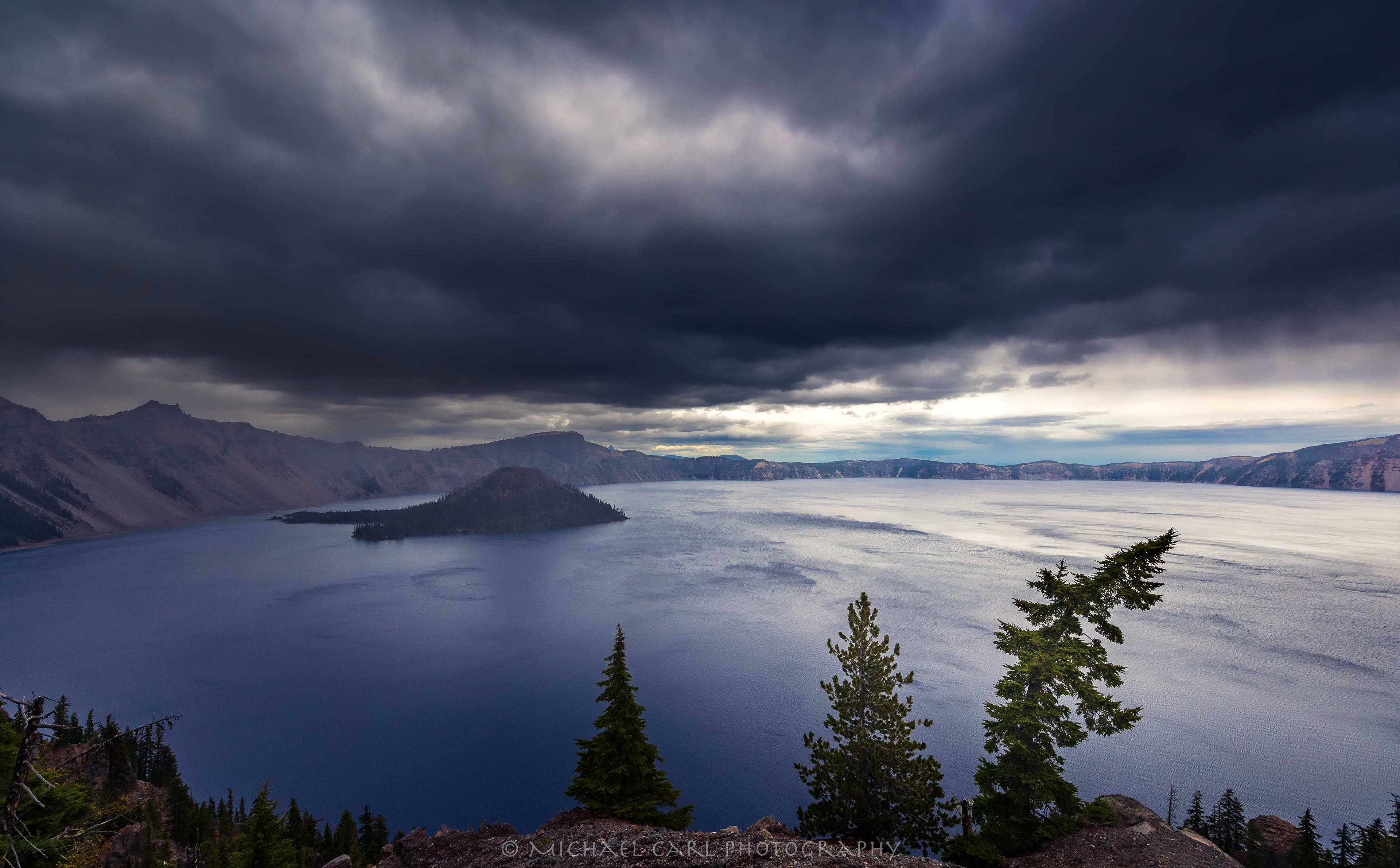 Oregon Cascade Mountains photography as storm clouds move over Crater Lake National Park.