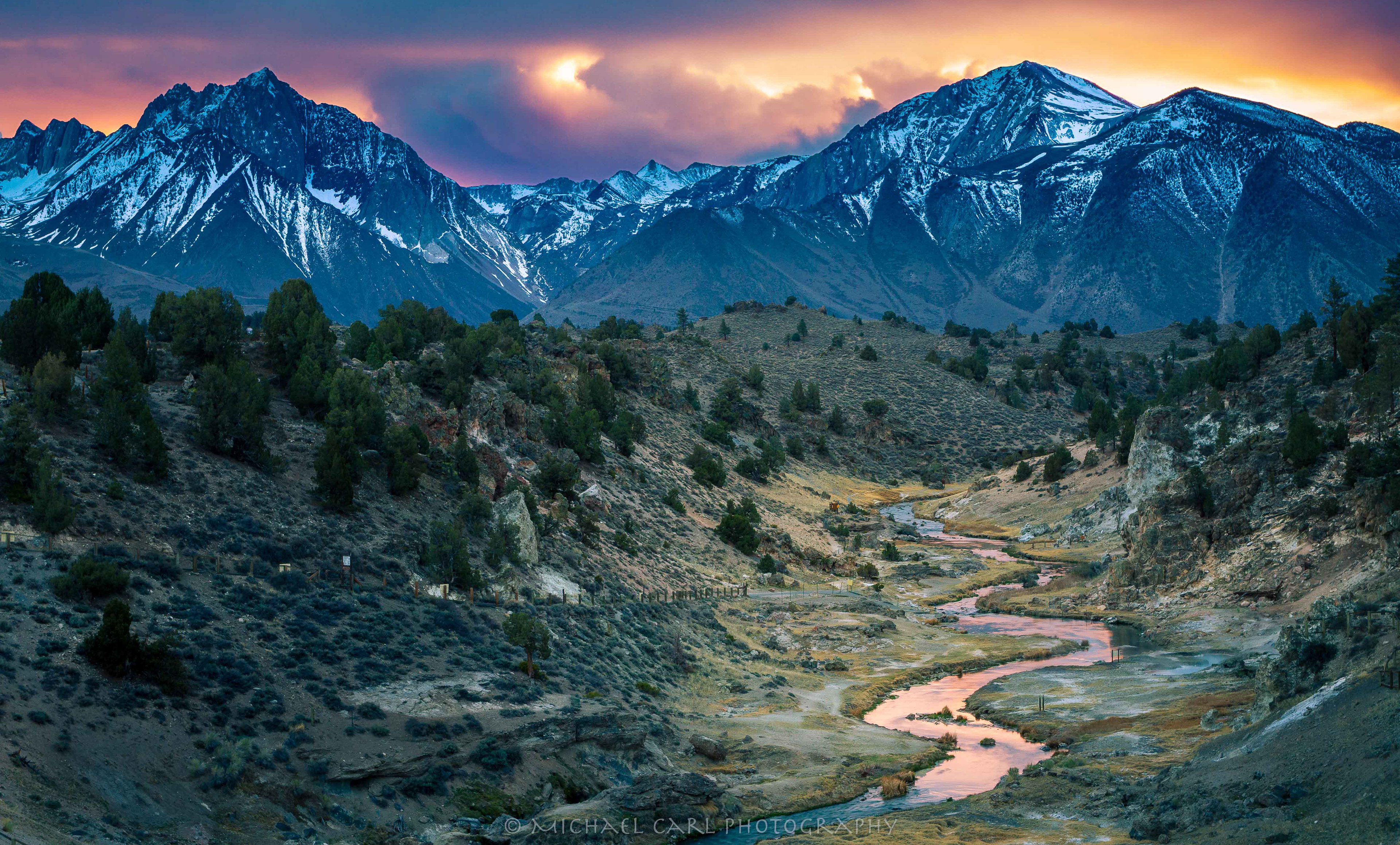 Sierra Nevada Mountains photography of sunset through storm clouds in the Owens River Valley