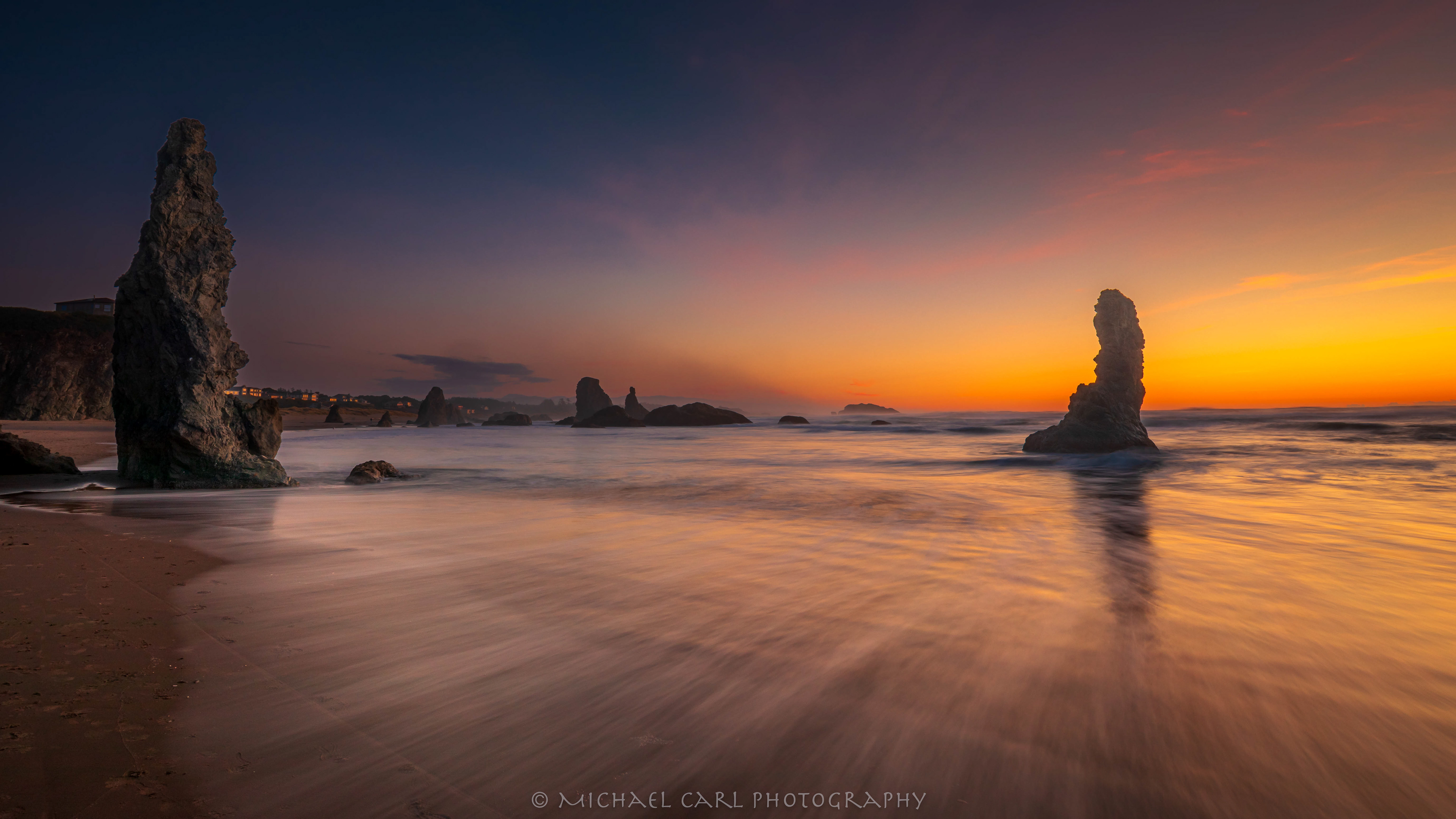 Oregon Coast photography featuring the seemingly endless stretch of sandy Bandon Beach with weathered seastacks