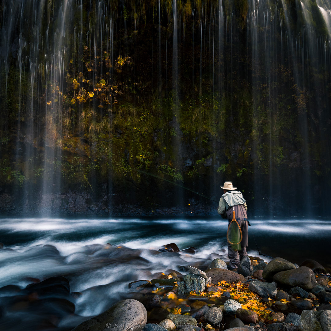 Fly fishing photography of angler below Mossbrae Falls along the Sacramento River.