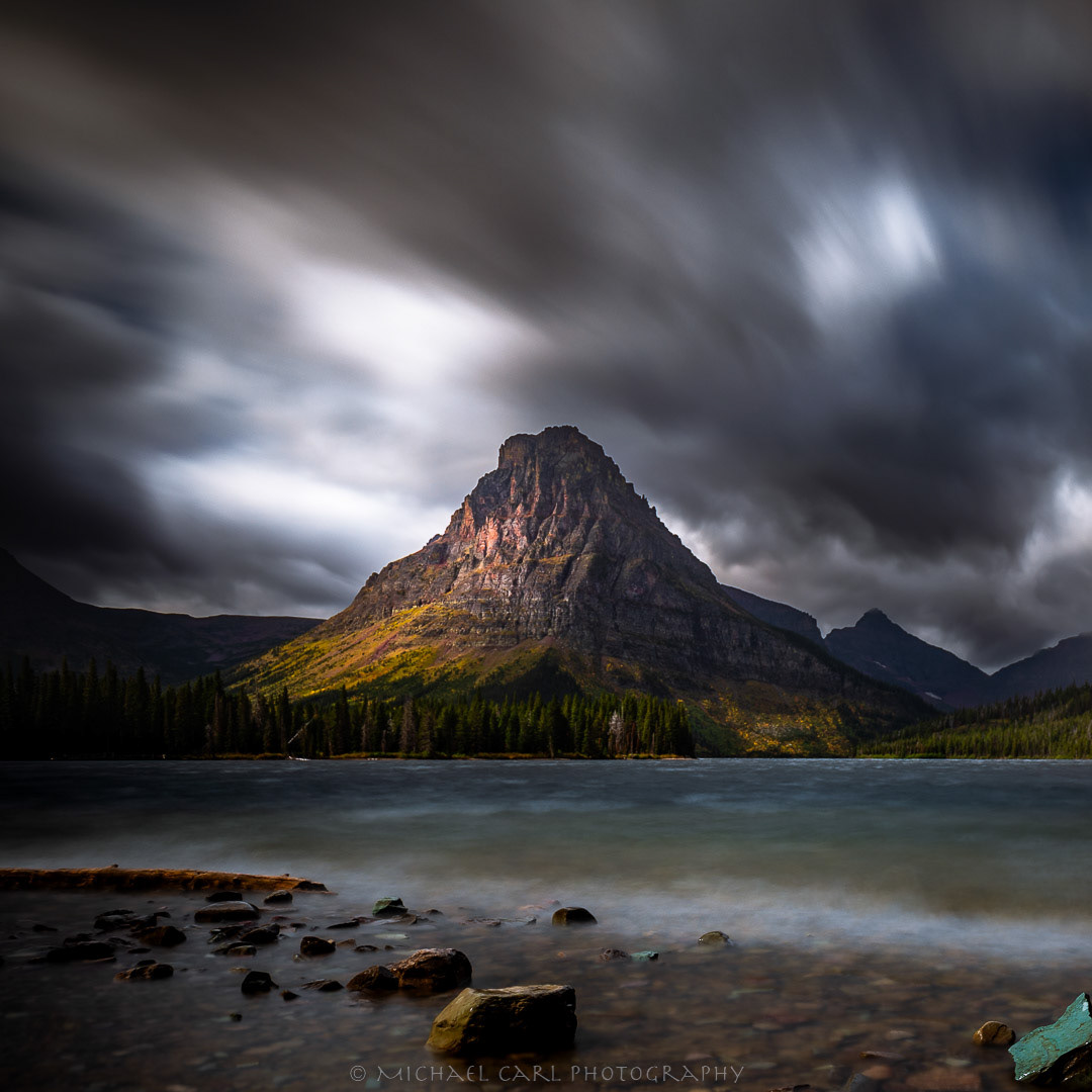 Glacier National Park photography of storm clouds over Two Medicine Lake.