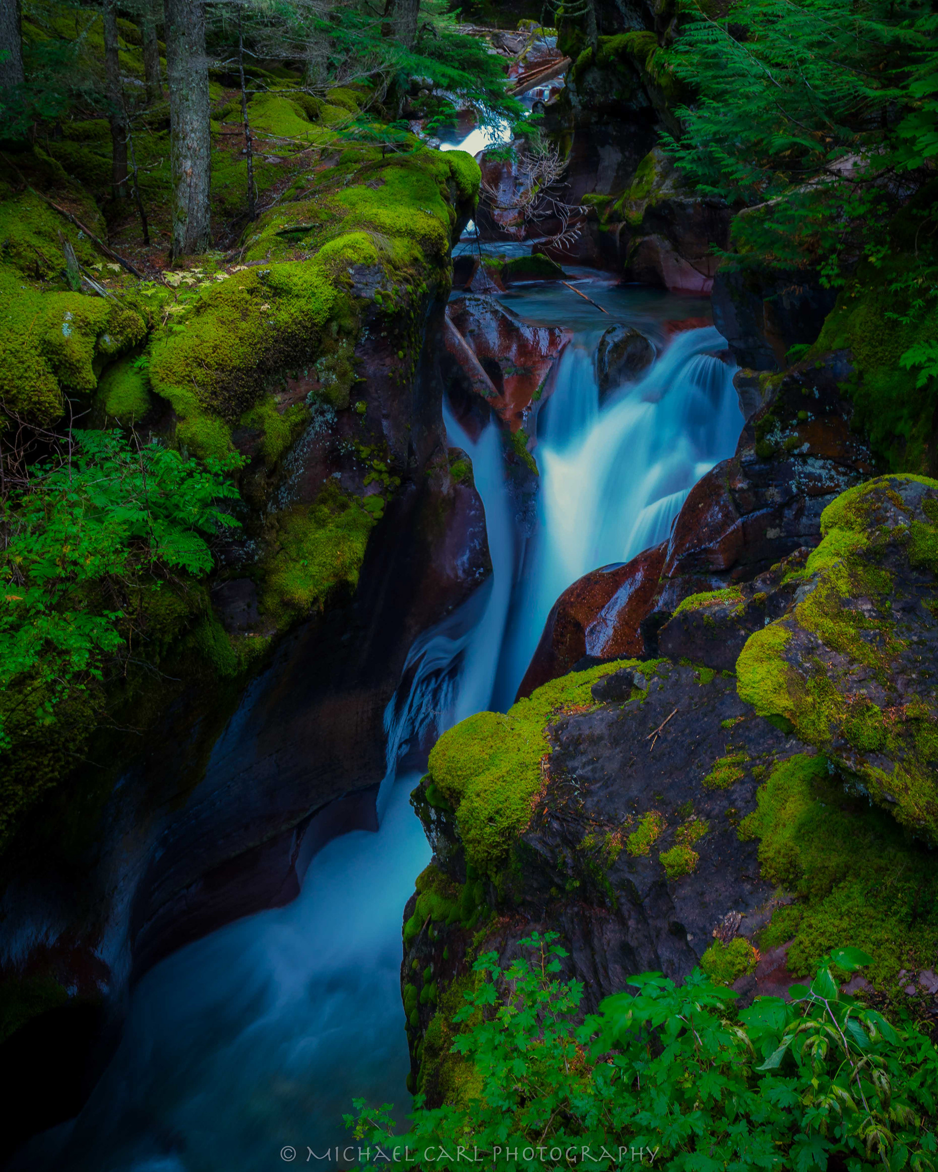 Glacier National Park photography of Avalanche Creek waterfall. 