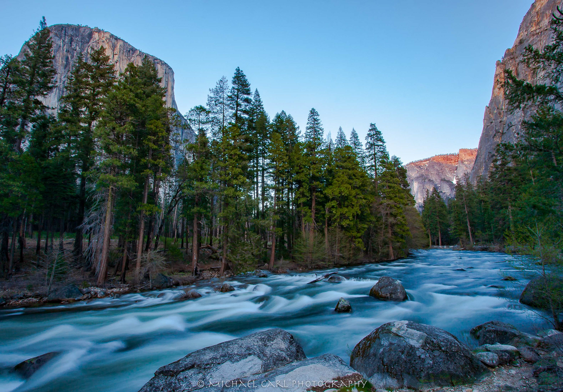 Sierra Nevada landscape photography of Merced River in Yosemite Valley durning Spring run-off.