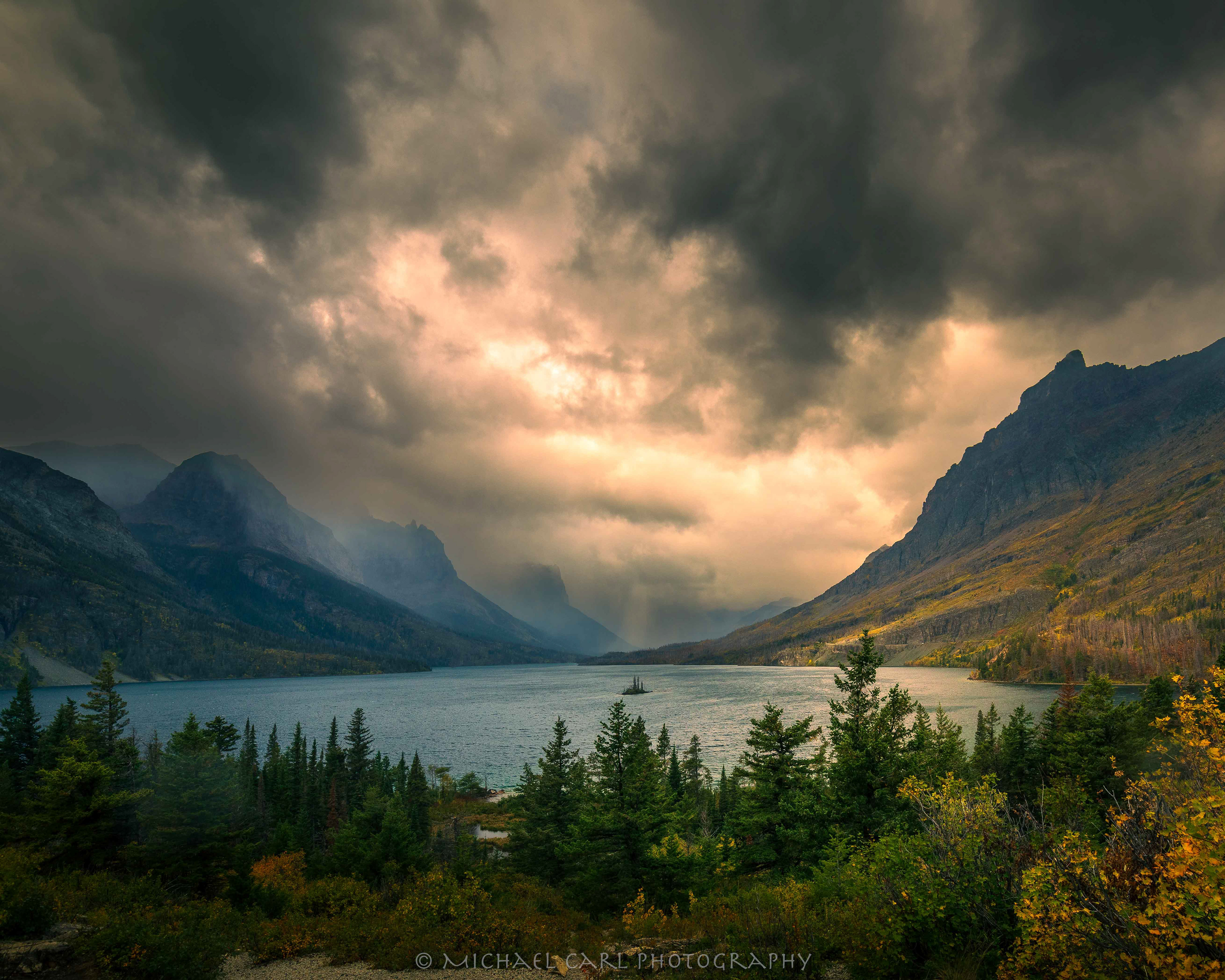 A huge storm rolls over Saint Mary Lake in Glacier National Park, unleashing powerful squalls of rain and wind.
