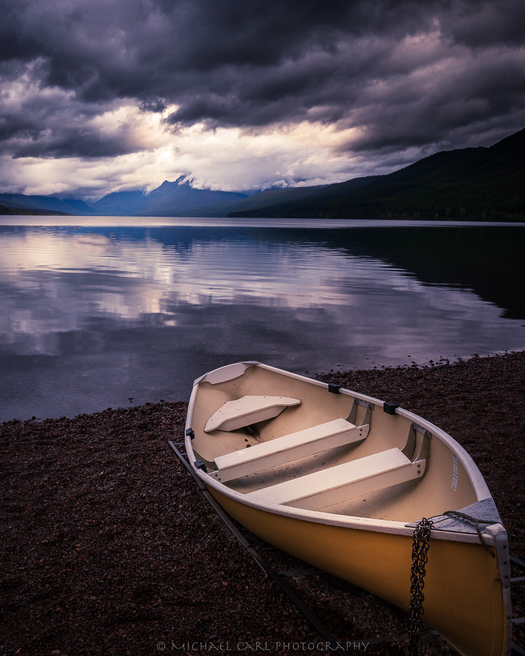 Glacier National Park photography of Lake McDonald reflecting clouds.