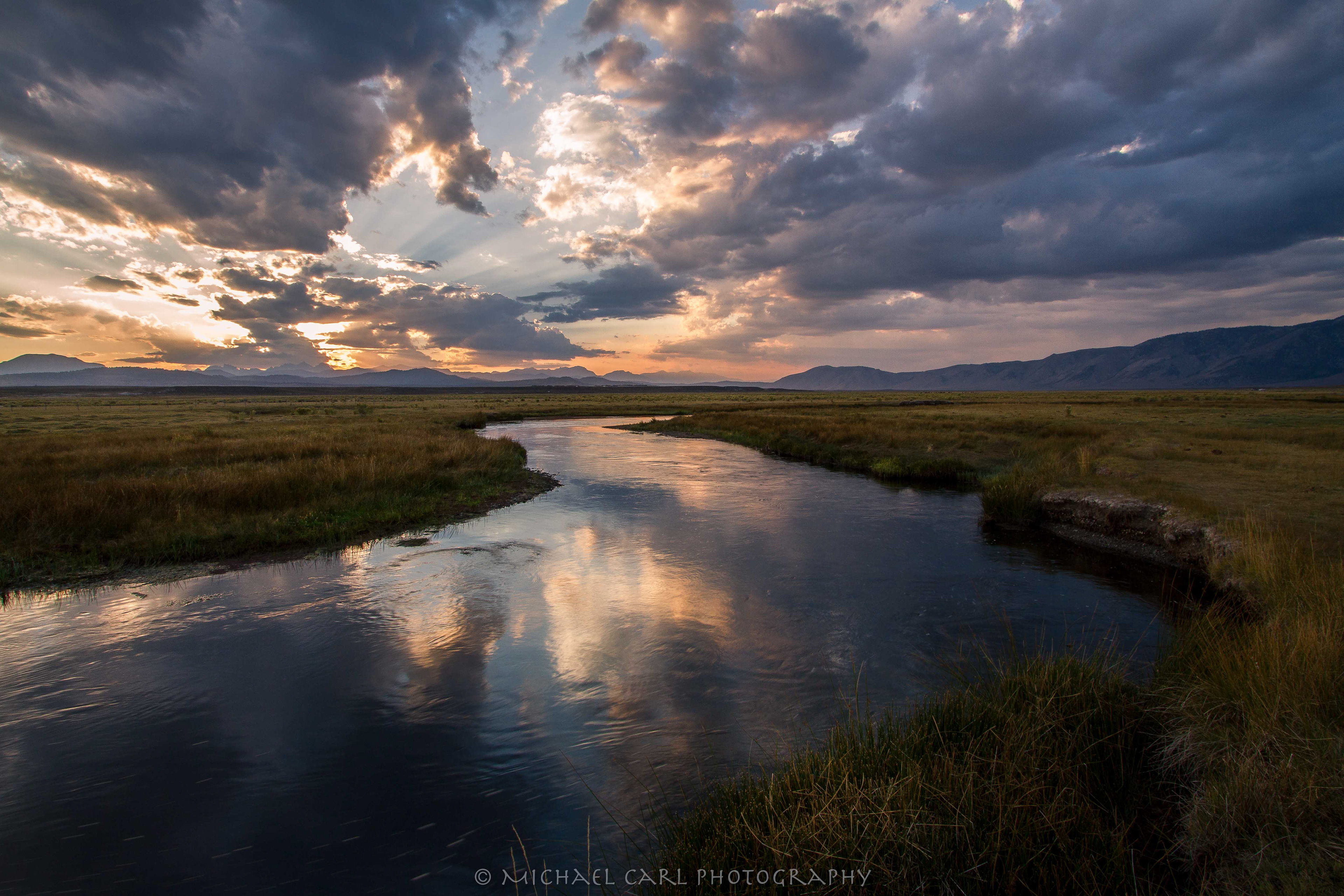 Waterscape photography of the Owens River as the sunsets over the Sierra Nevada Mountains.