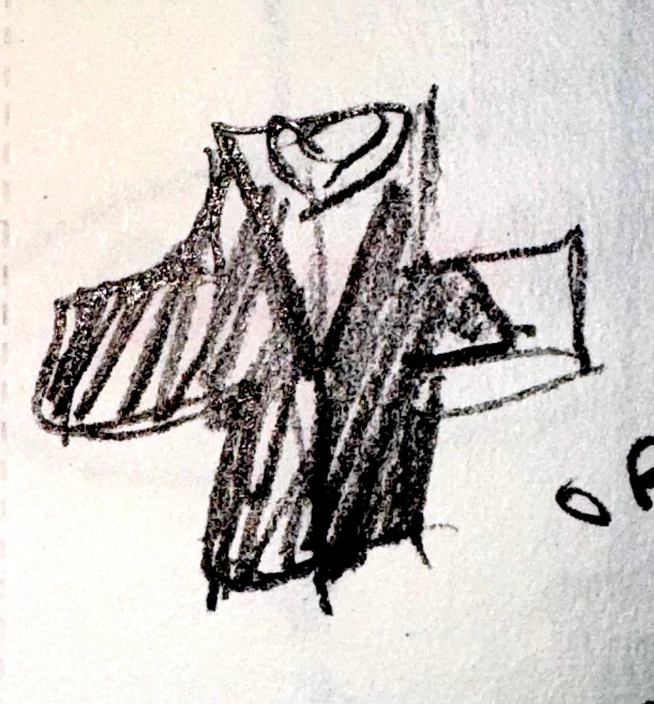 A quick sketch of a cross-like logo featuring a dog and cat.