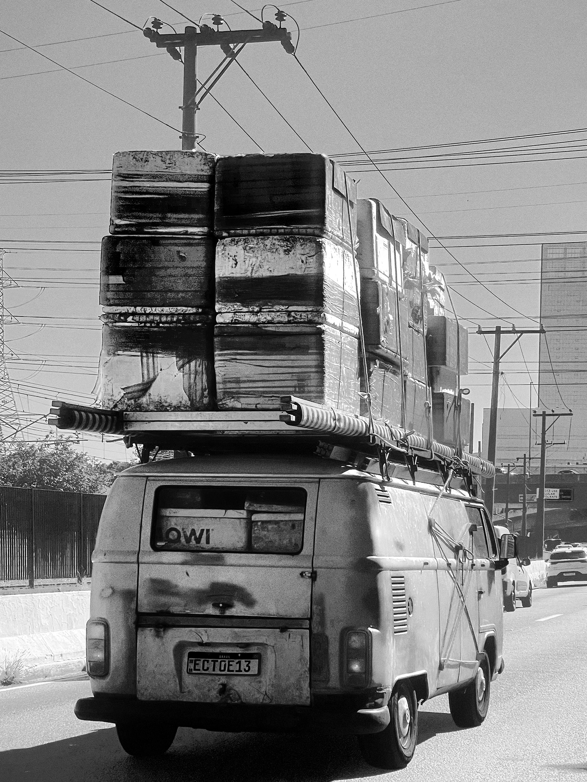 Back home: rear view on the highway, returning from the street market