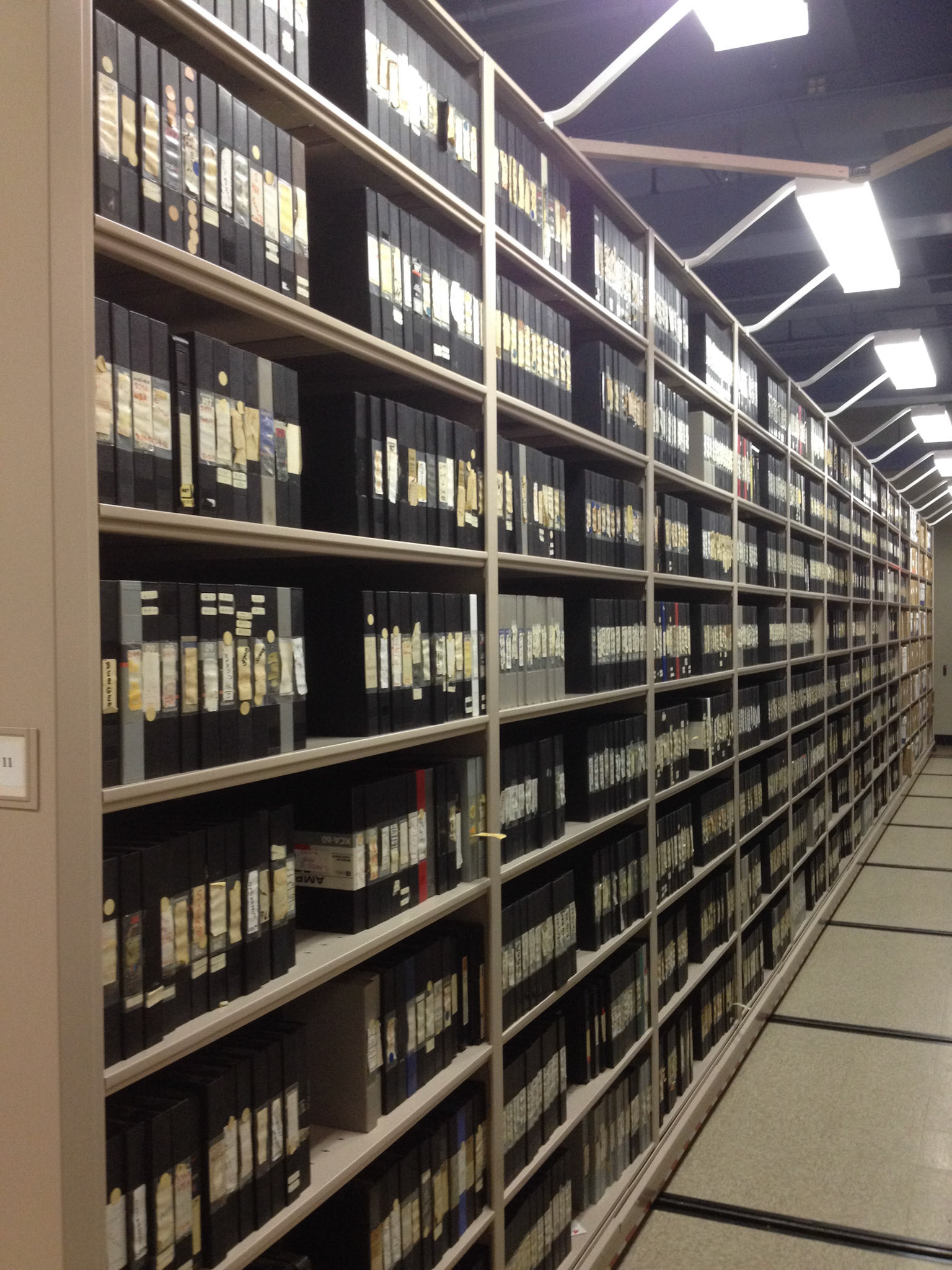 Video tapes stored in compressed shelving