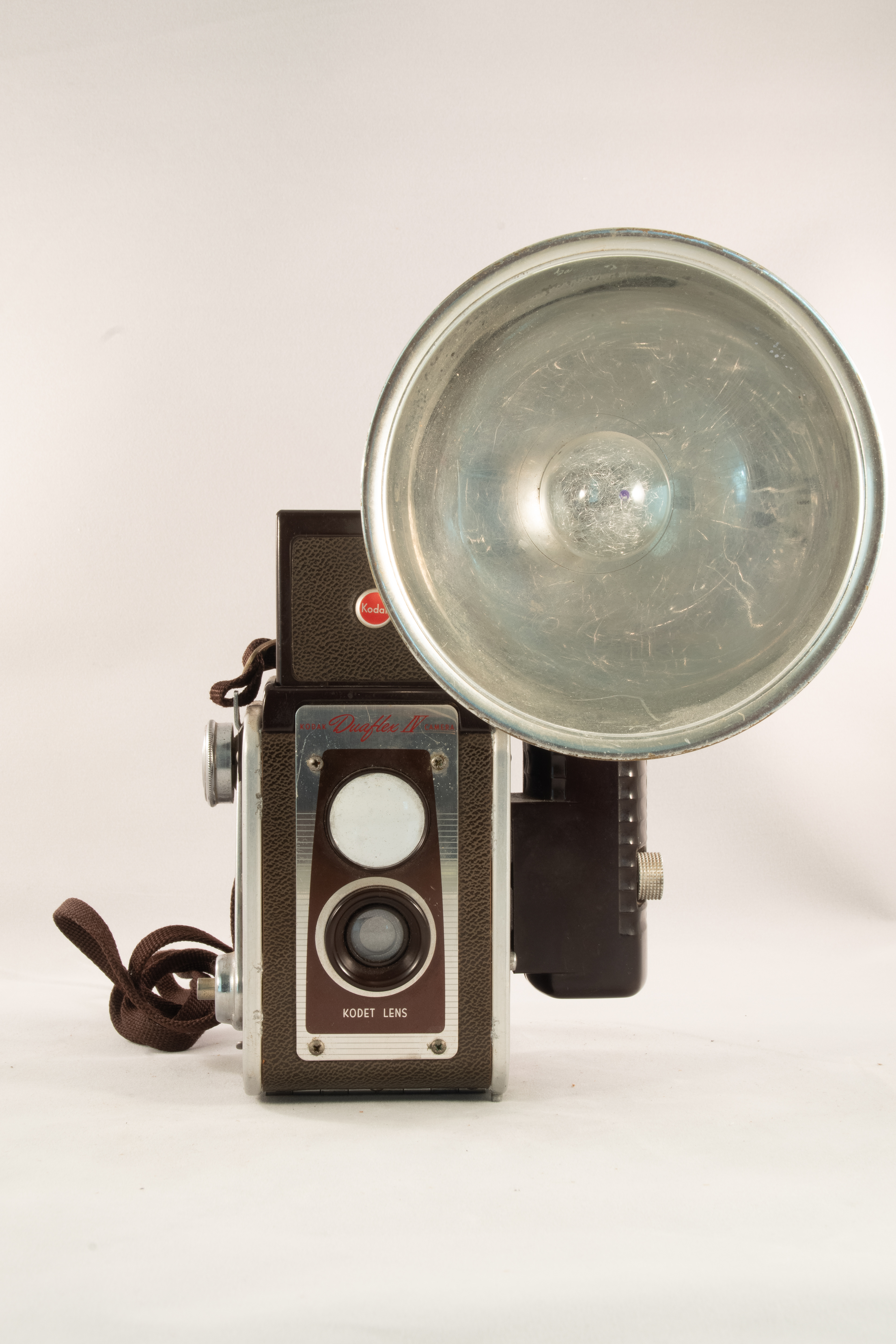 Considered a Pseudo Twin Lens Reflex (TLR) camera, since the top "lens" is the viewfinder.
