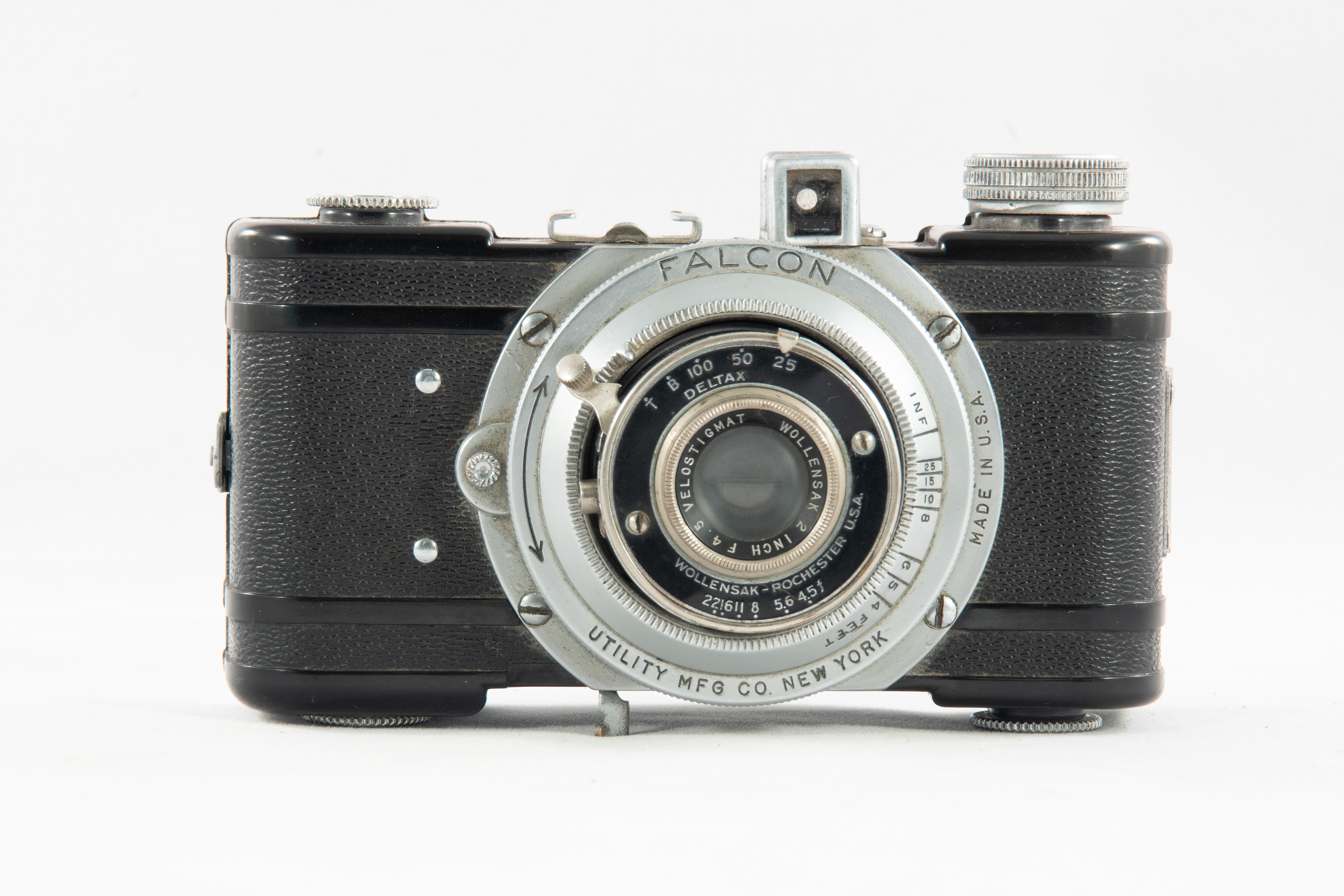 Bakelite body with metal back & trim.  Much more solid than other Utility offerings.