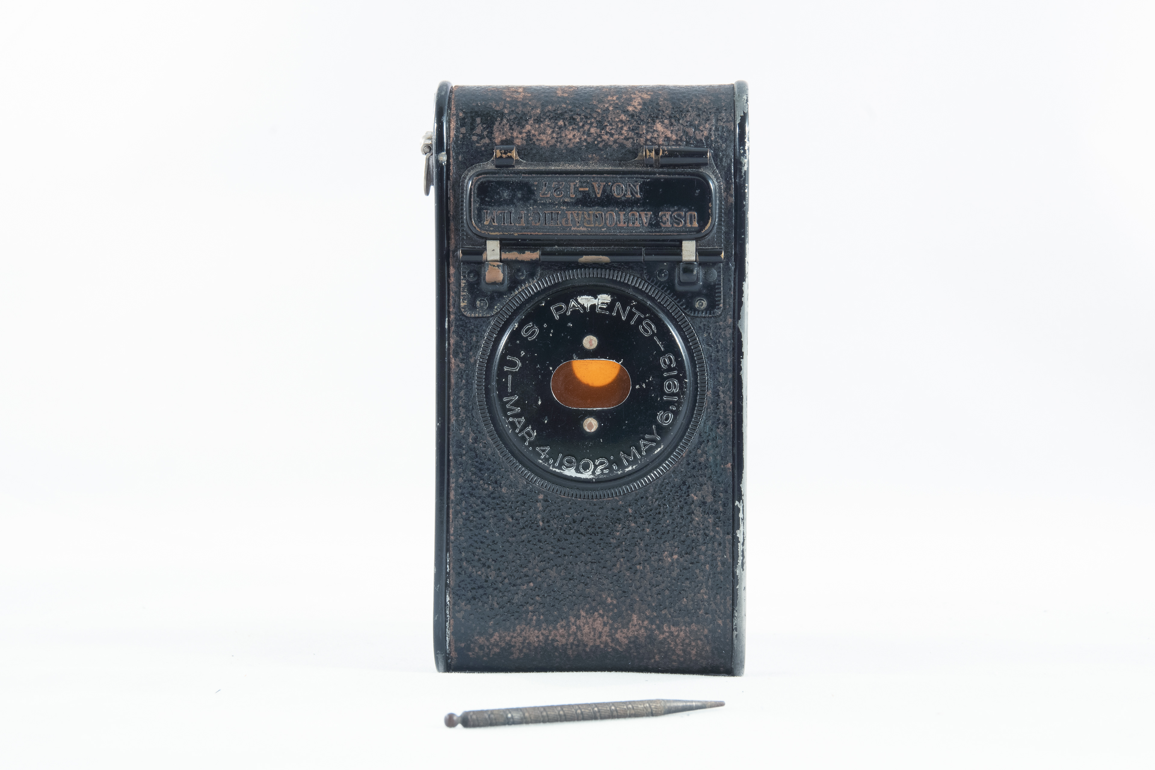 You can see the original stylus in this pic.  It would let you lift the little door and "write" directly onto the film.  Whatever you wrote would be visible on the final picture.