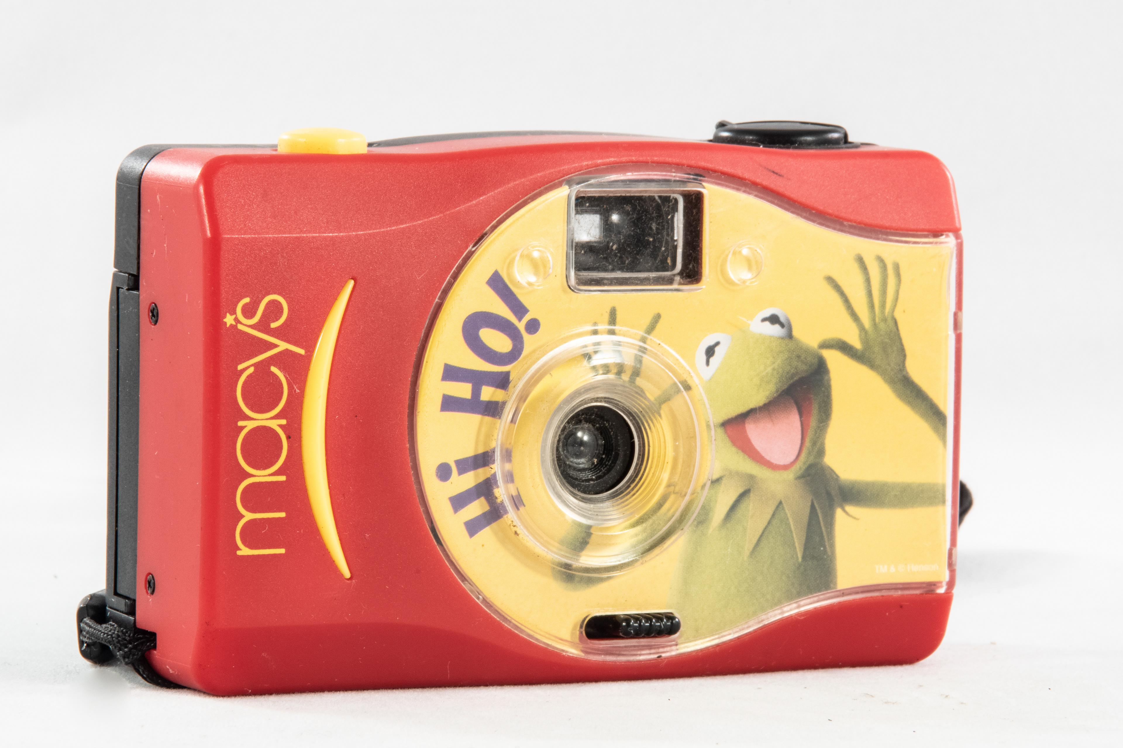 2002 - Kermit the Frog-tographer - Macy's produced an exclusive Kermit the Frogtographer plush doll for the Holiday season in 2002. The toy was released to promote the debut of a new Kermit balloon in the Macy's Thanksgiving Day Parade after the previous Kermit balloon had been left out of the parade since 1991.