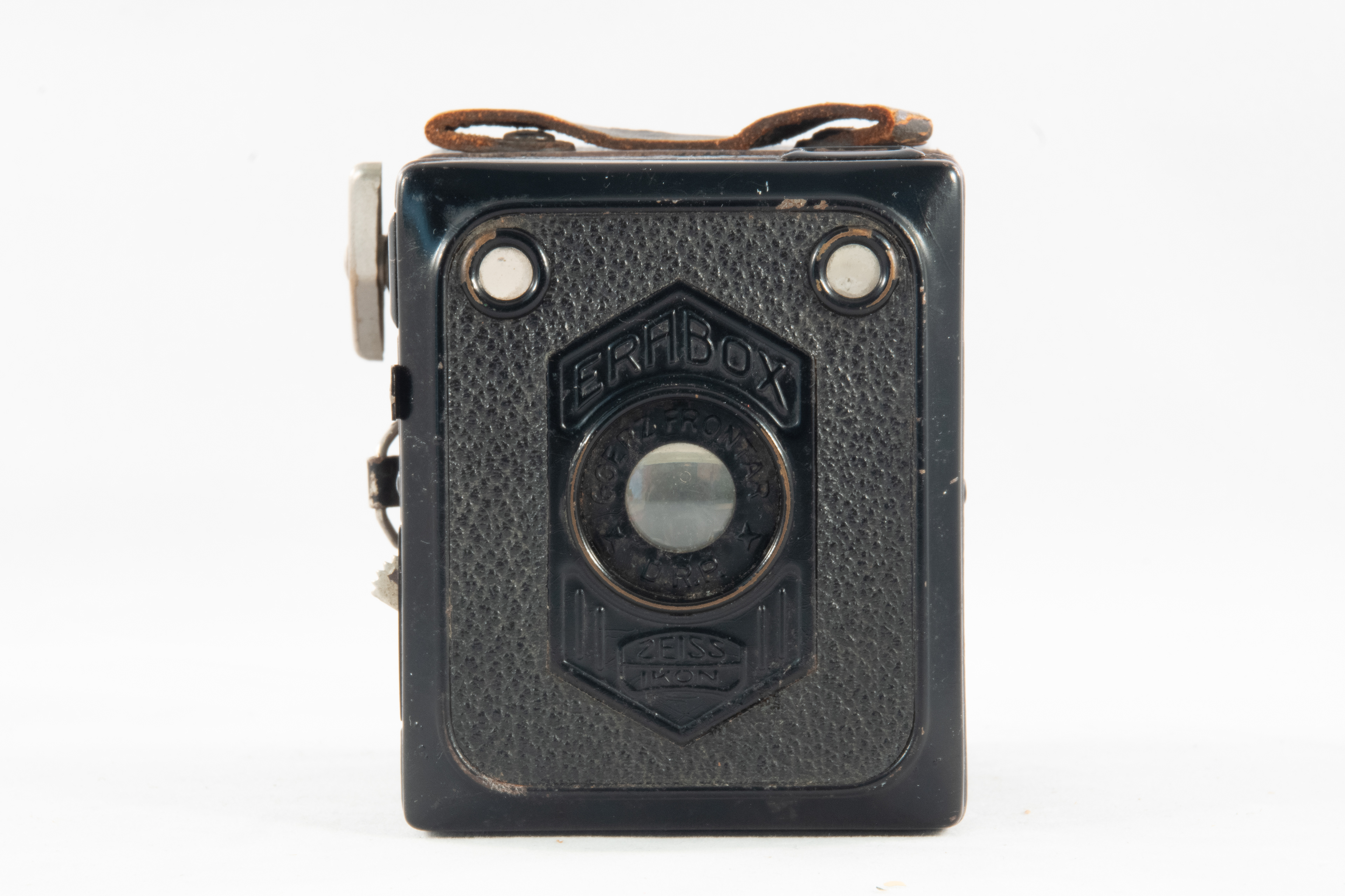 Shutter not working.  Original strap.  Made in Germany. Goerz Frontar lens.  produced during the main Art Deco period elongated hexagonal motif on front