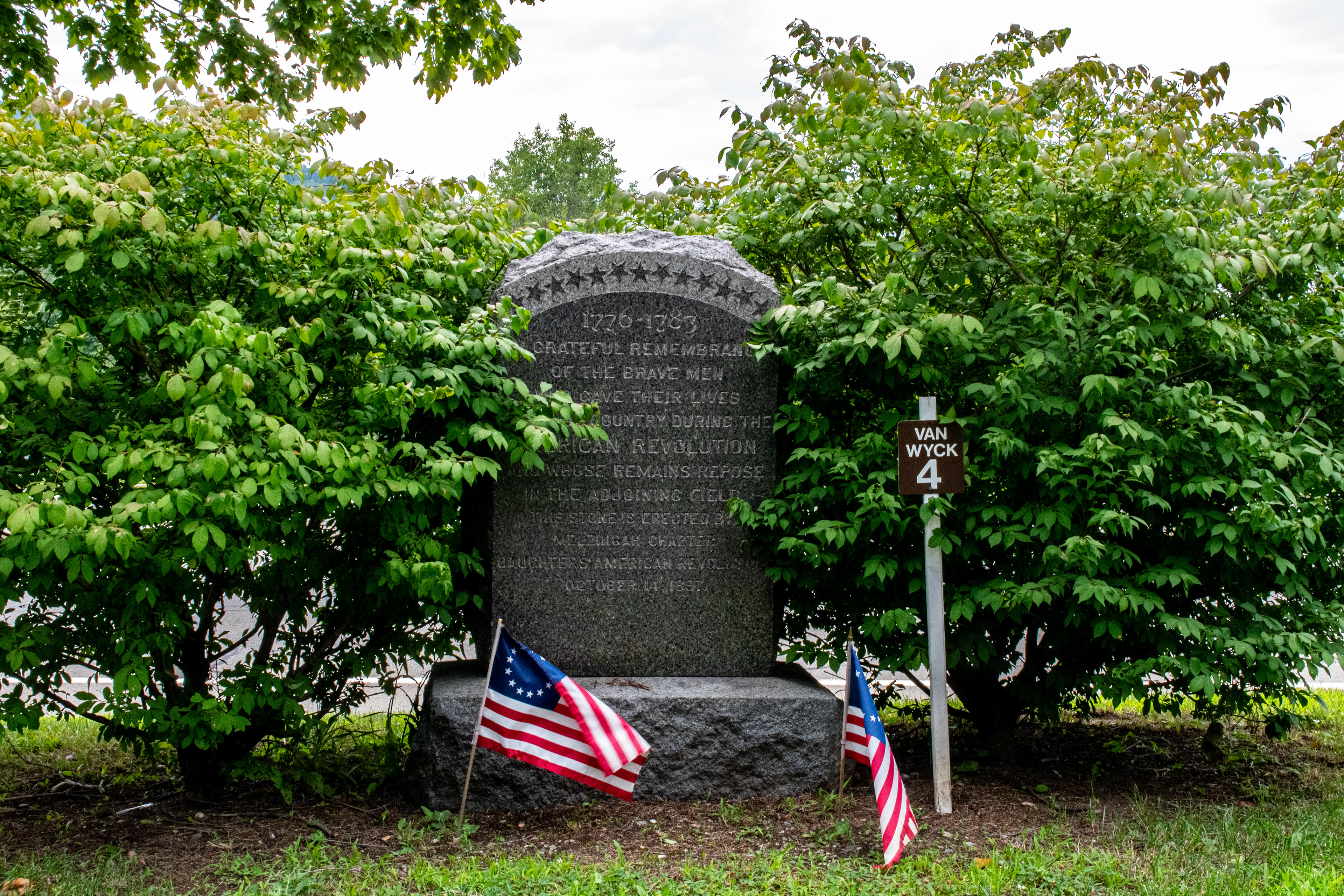 This marker was moved here from 1/2 a mile south. It marks the largest single Revolutionary War burial site, with 500-1000 soldiers buried there. Can still visit the site today.