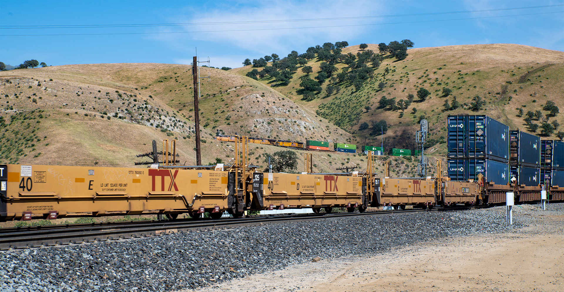 The Front of the Foreground Train is Exiting Tunnel 5 in the Background at Bealville, California