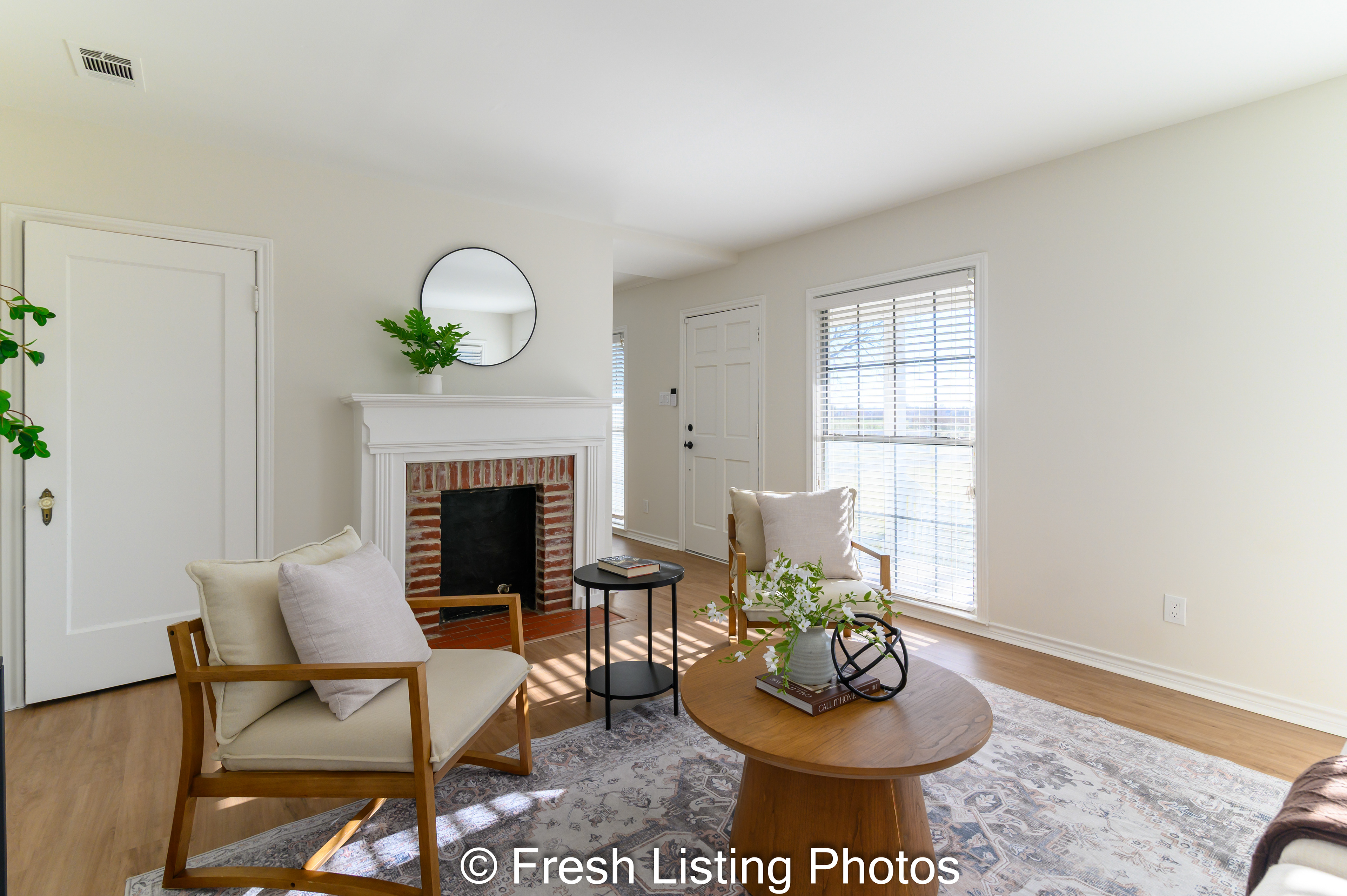 Living room interior with fireplace and foyer