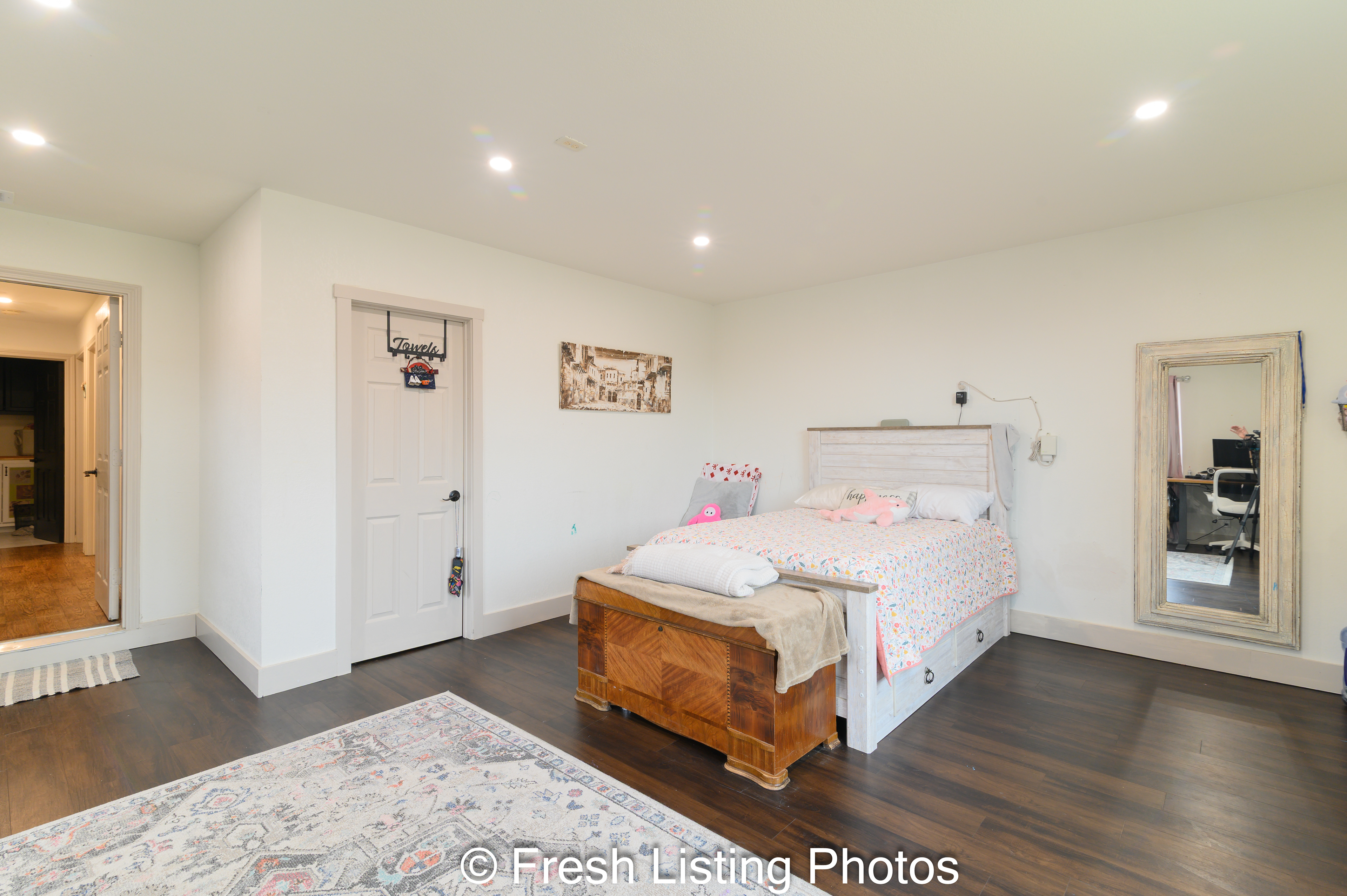 Bedroom with closet and hallway