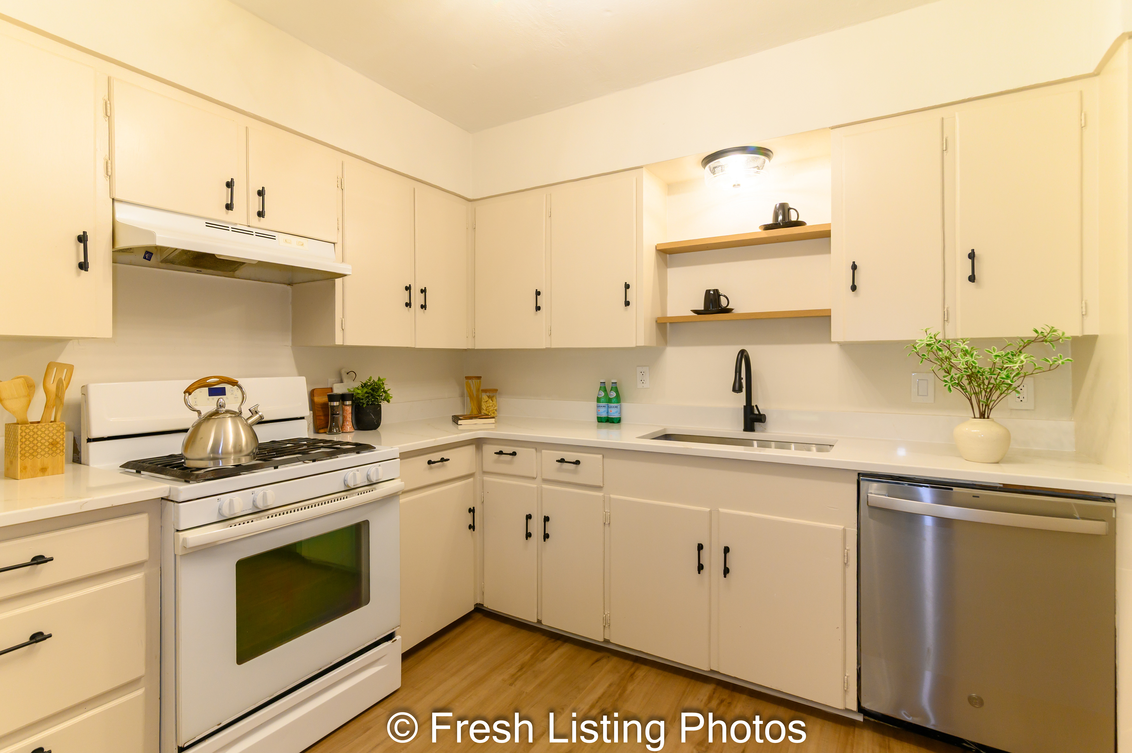 Kitchen with gas range and dishwasher
