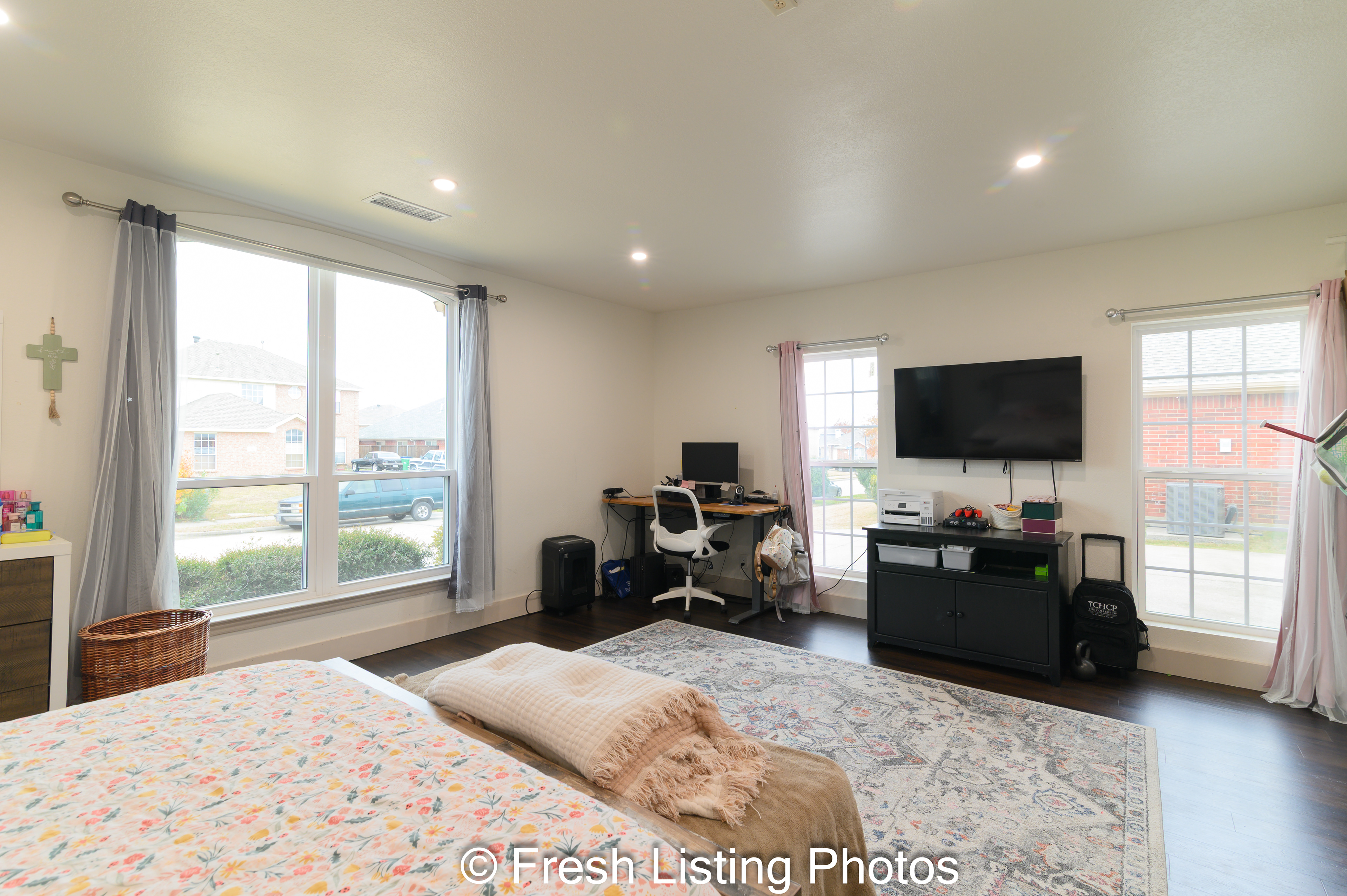 Bedroom with window and home office area