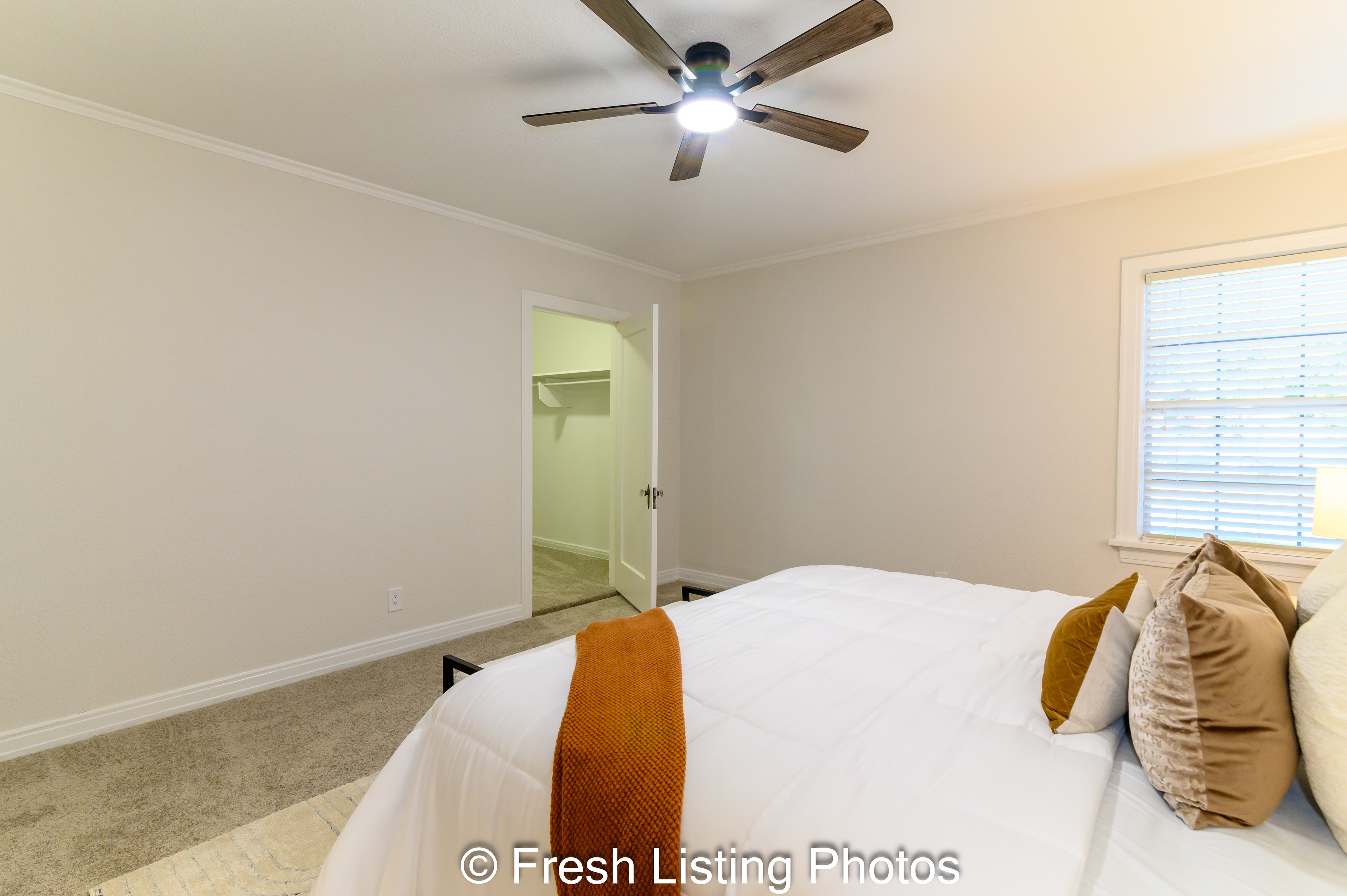 Primary bedroom with walk in closet