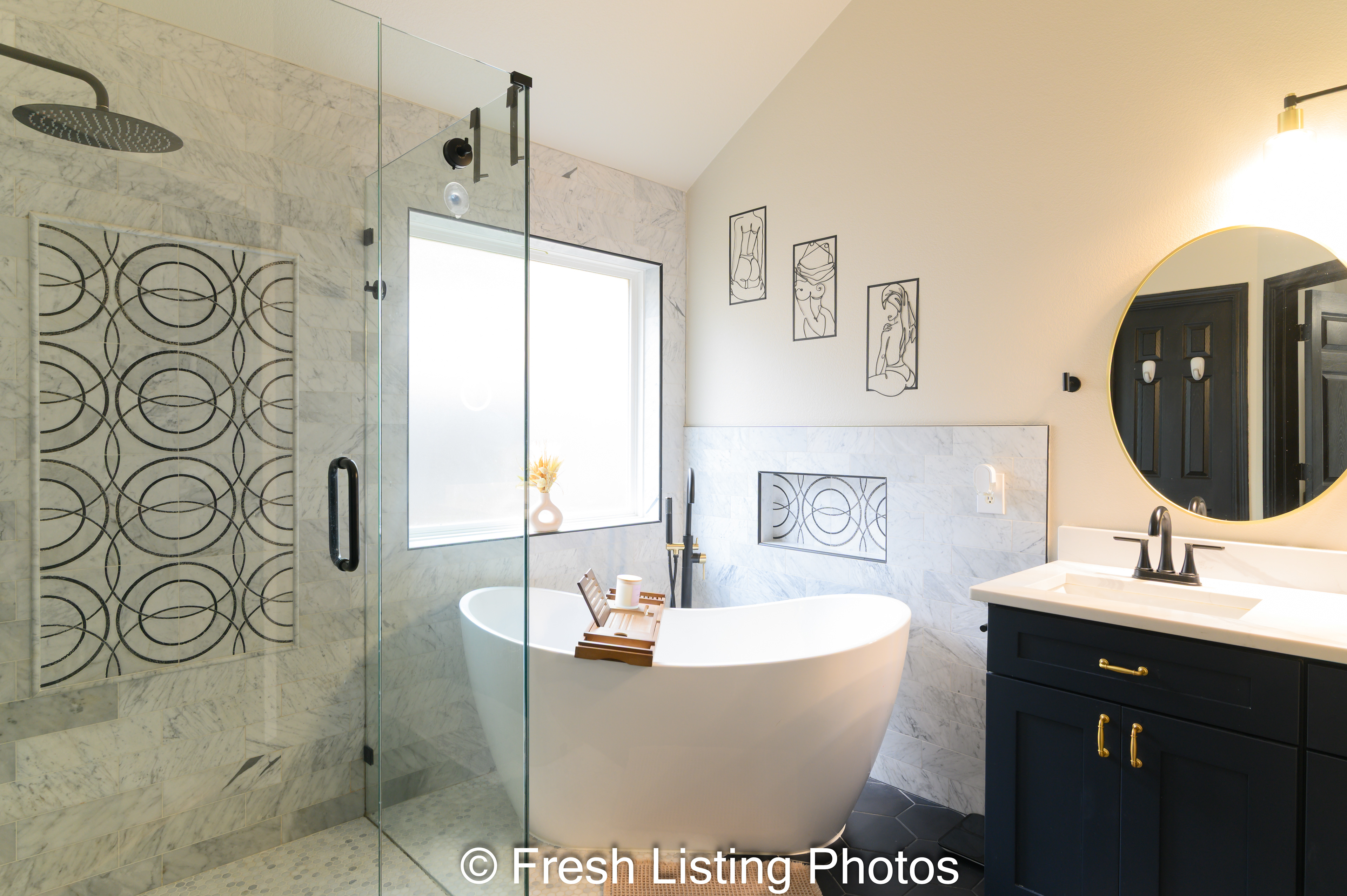 Primary bathroom with walk in shower and bathtub