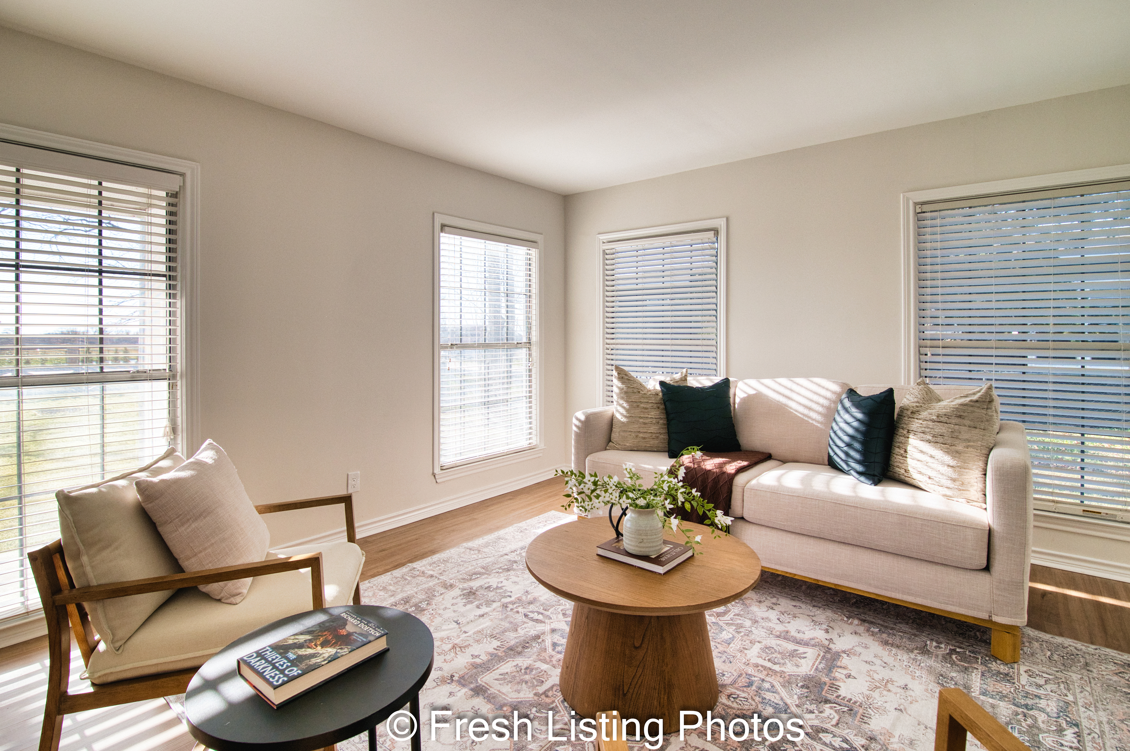 Furnished family room with several windows