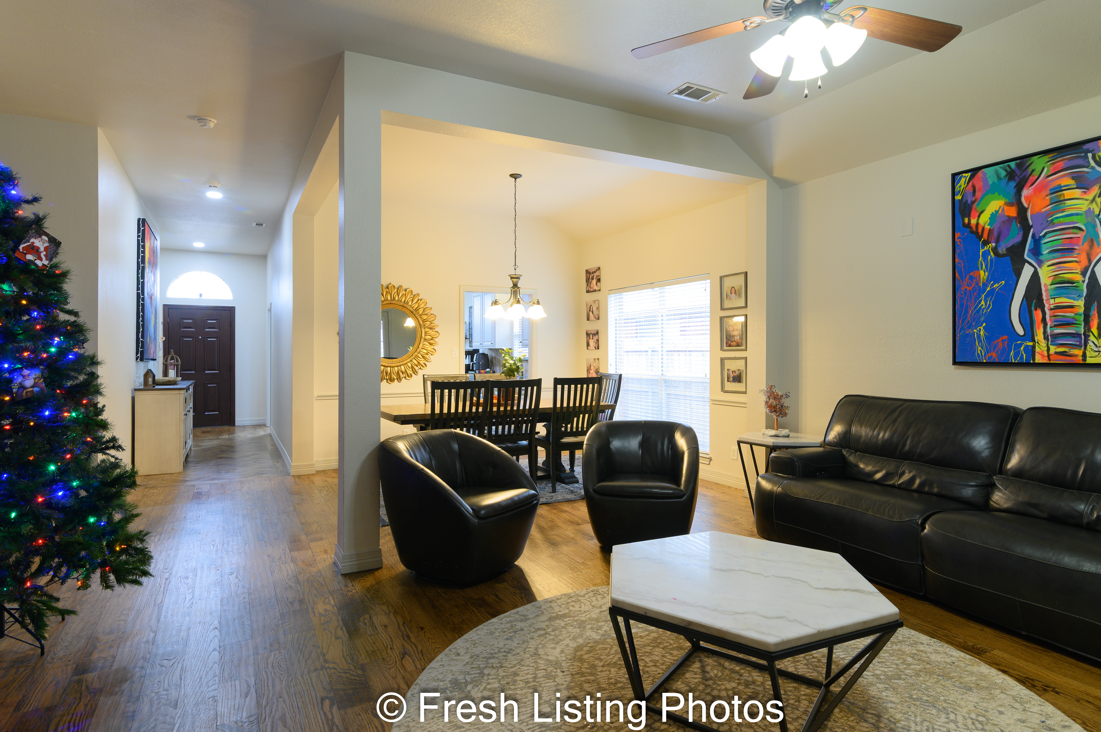 Living room with view of dining room