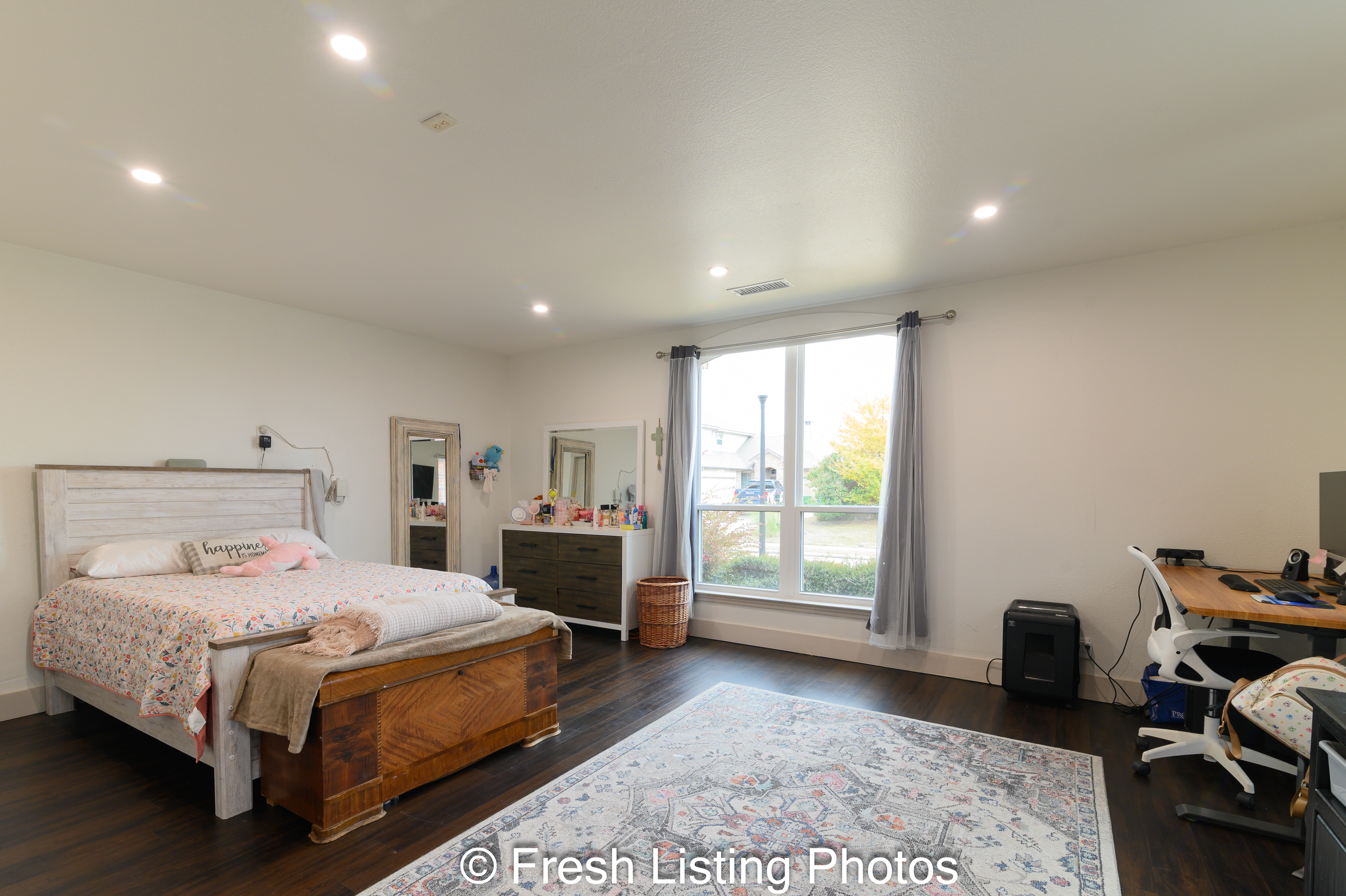 Bedroom with window and home office area