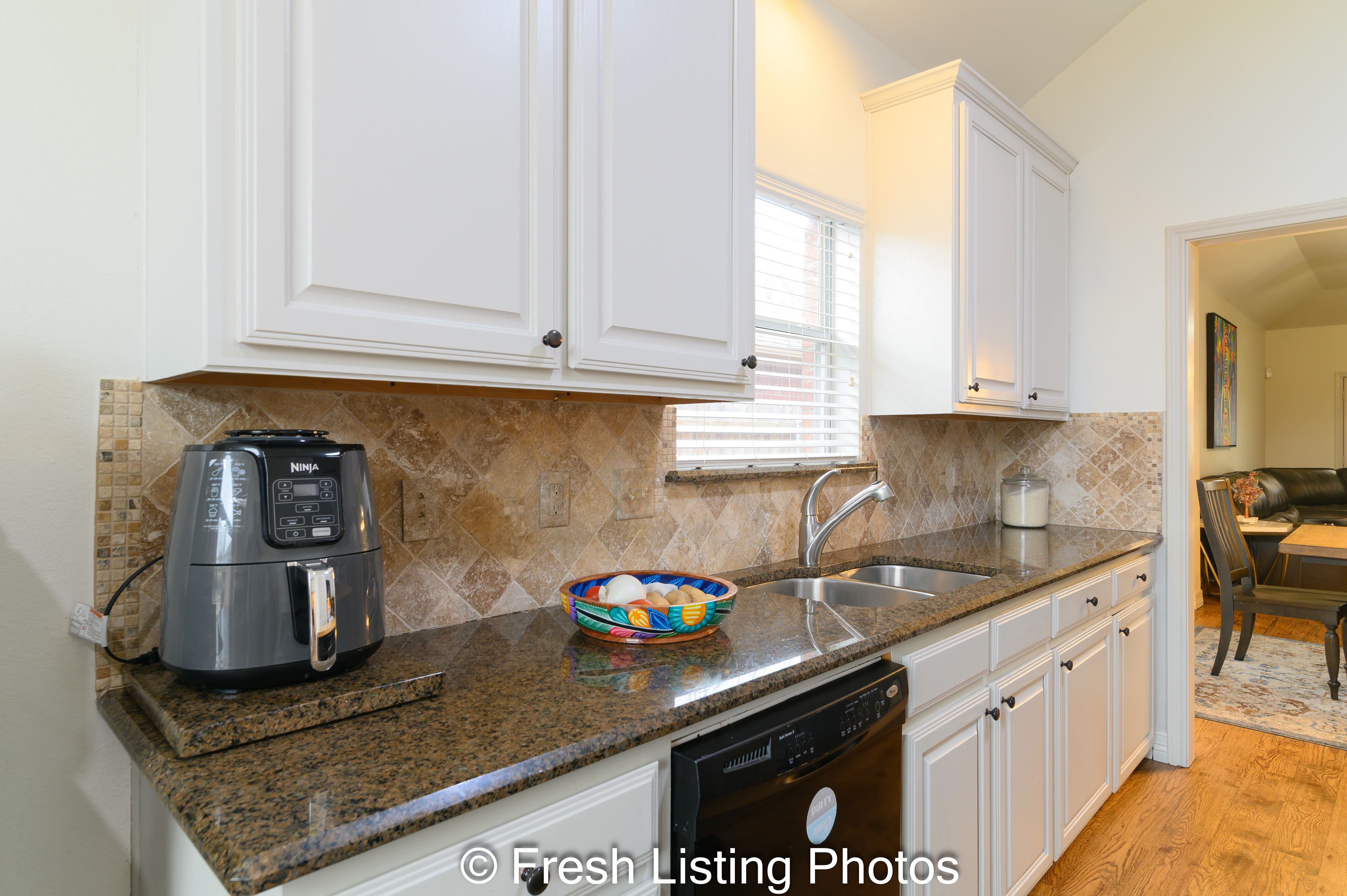 Kitchen with dishwasher and sink