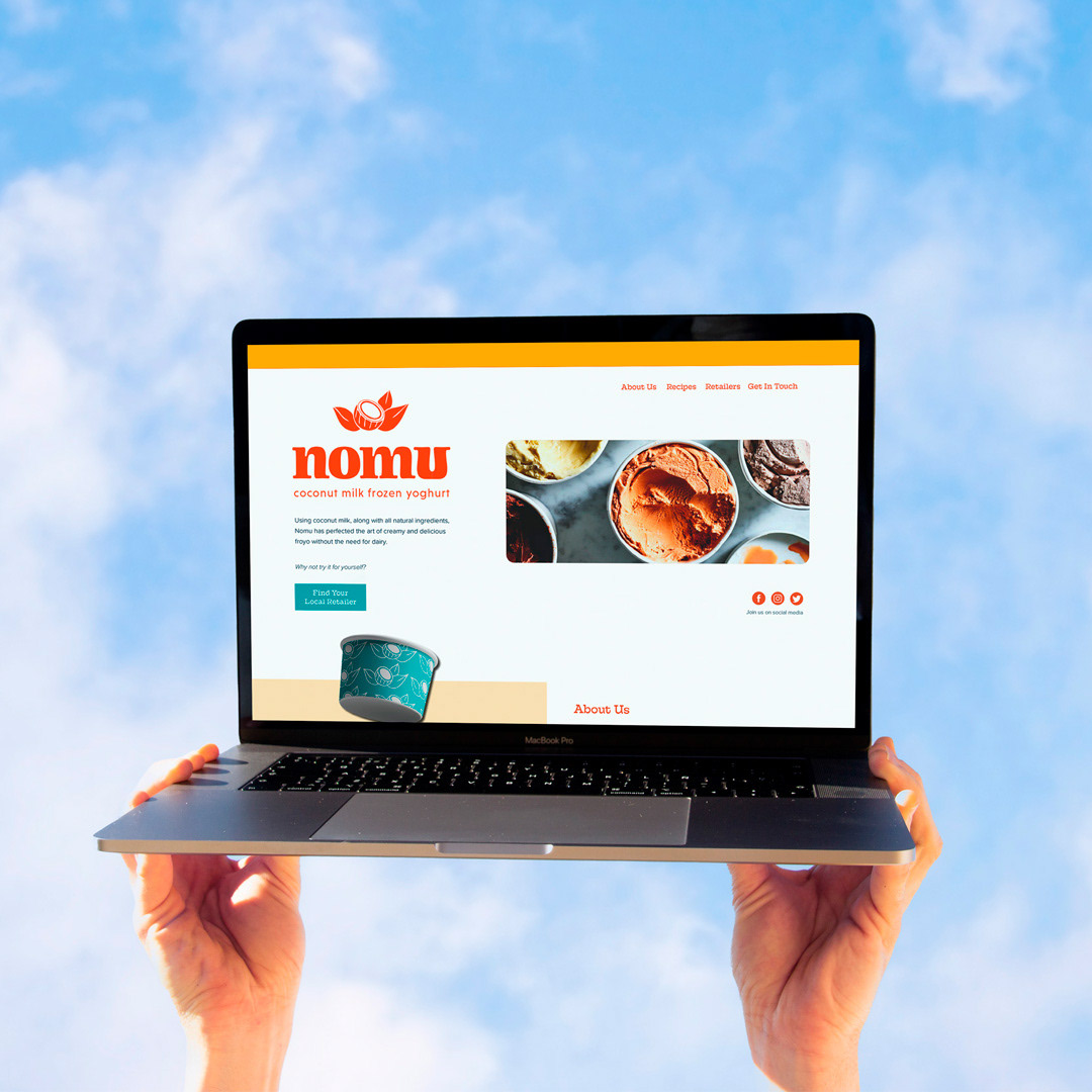 Nomu vegan frozen yoghurt website design displayed on a laptop screen
