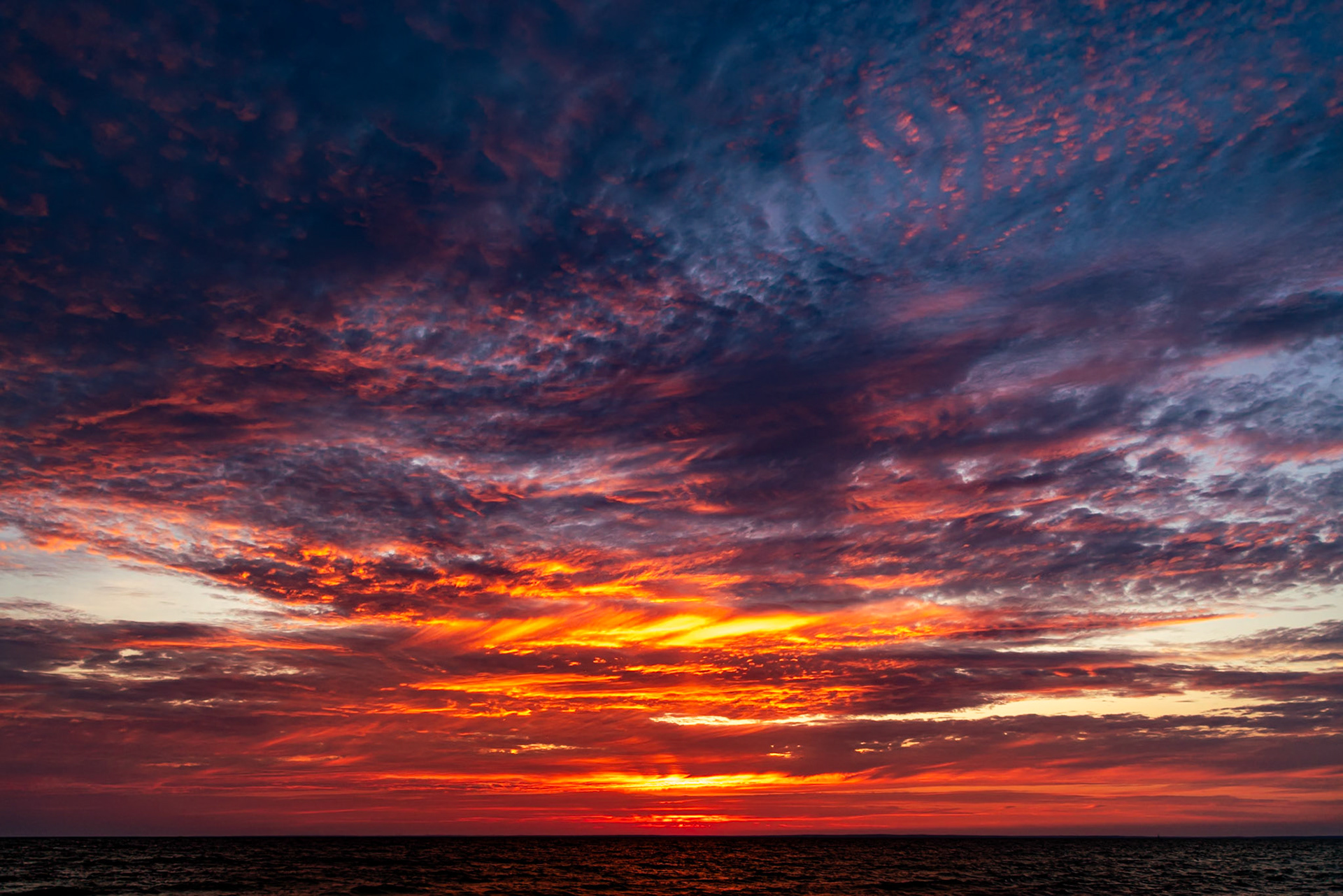 Mother Nature takes a paint brush to the sky in this beautiful summer sunset over Buzzards Bay