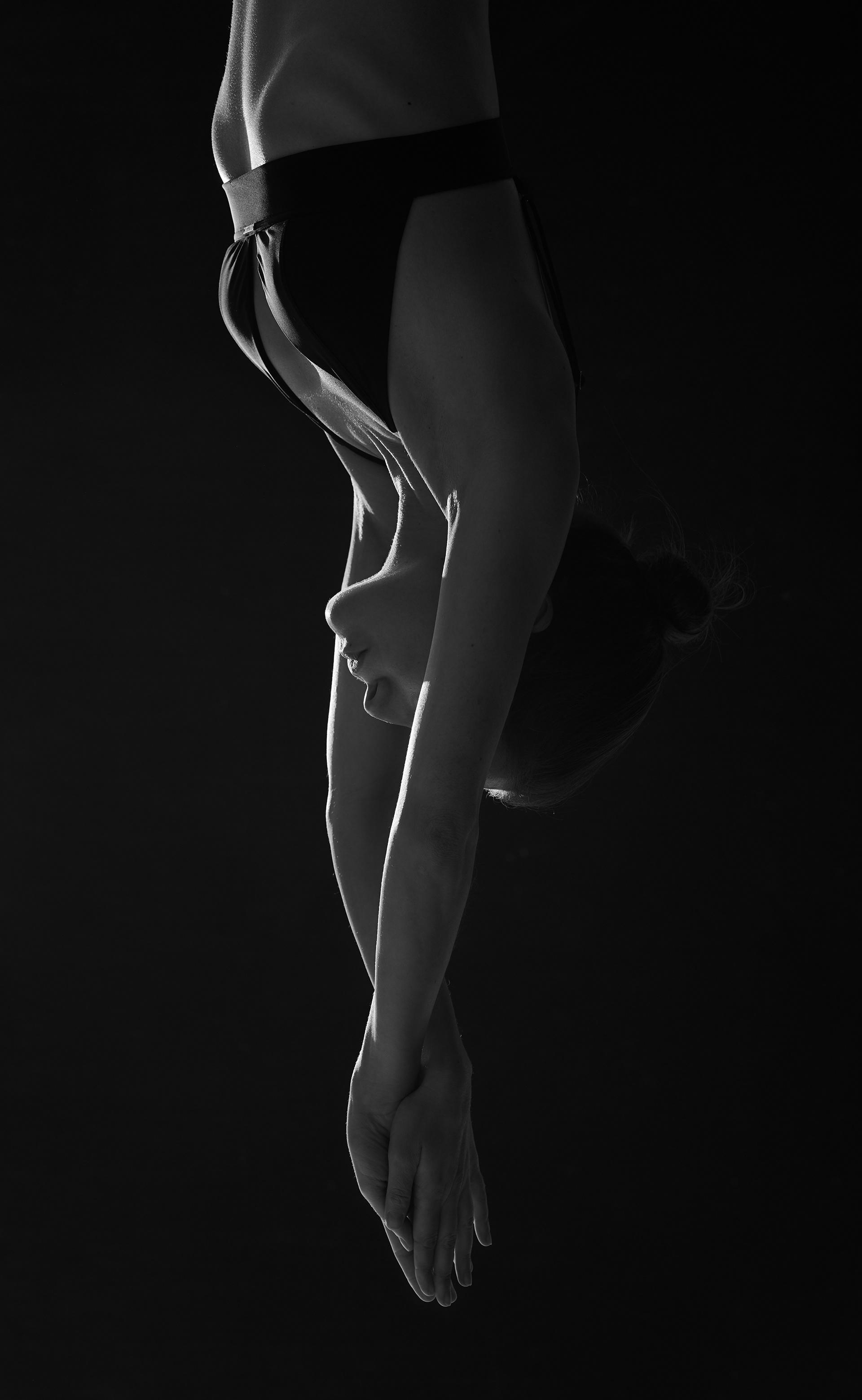 Portrait of diving swimmer in backlight shot by commercial photographer David Schweiger