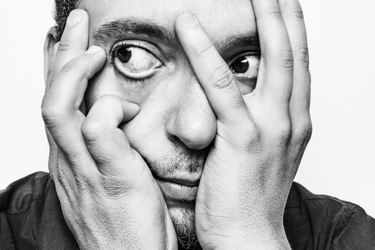 Portrait of a man with hands shot by portrait photographer David Schweiger