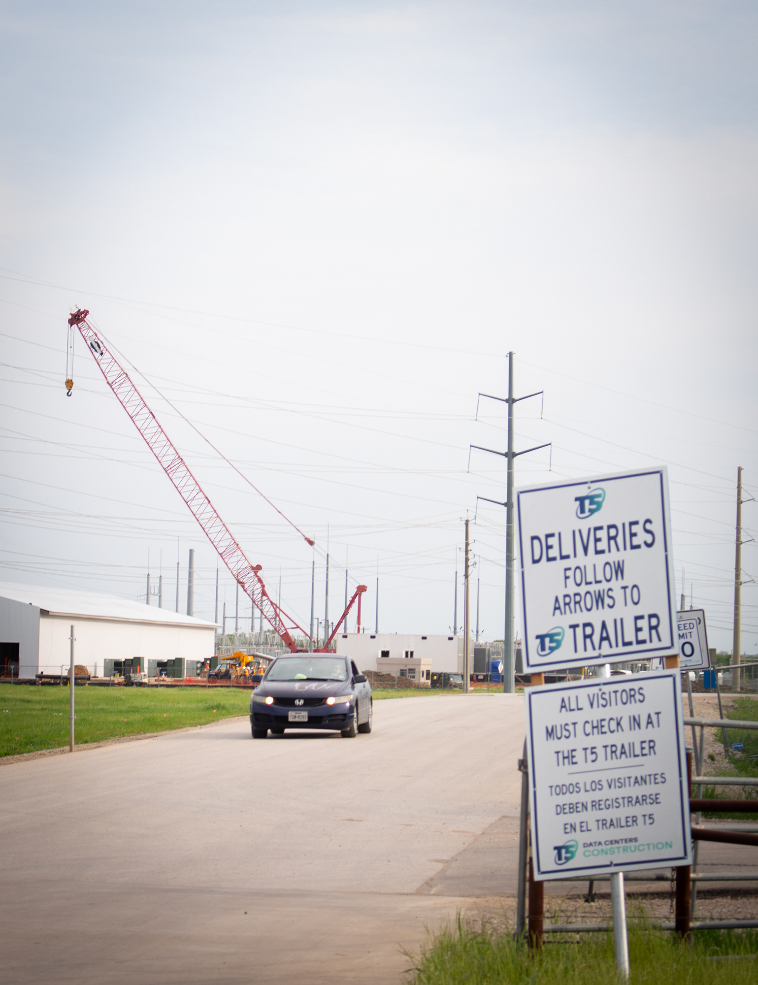 DENTON, TEXAS April 14, 2025  Workers leave at the end of the work day at the Core Scientific construction site in Denton, Texas. The site has been under construction since a $6.1 billion expansion of the facility was approved by Denton City Council in 2024. Photo/ Natalie VanDerWal