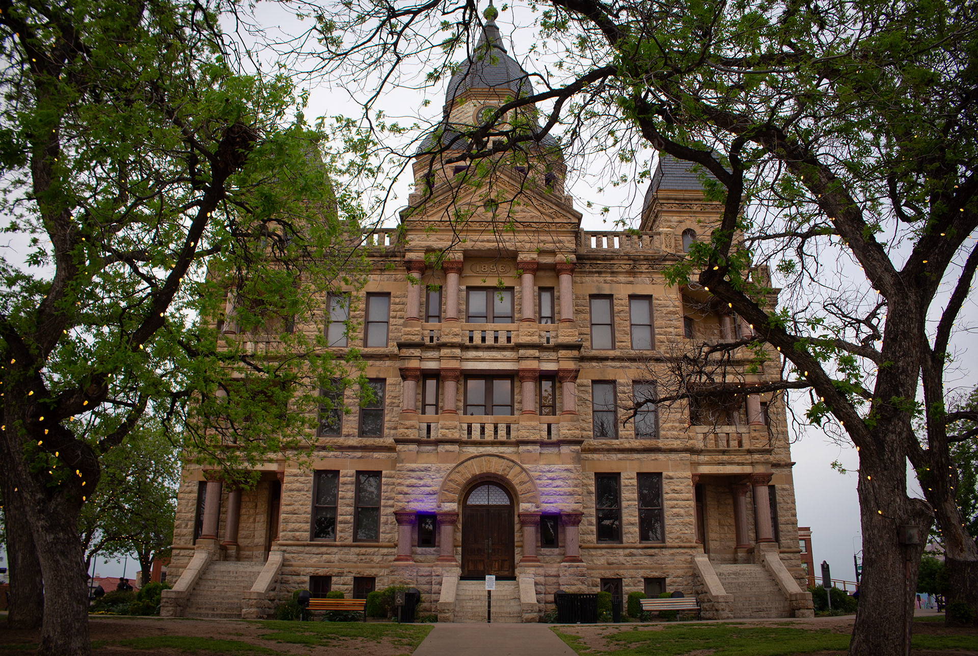 DENTON, TEXAS April 14, 2025  The Courthouse-on-the-Square Museum in Denton, Texas is framed by large trees in the historic Denton Square. Photo/ Natalie VanDerWal