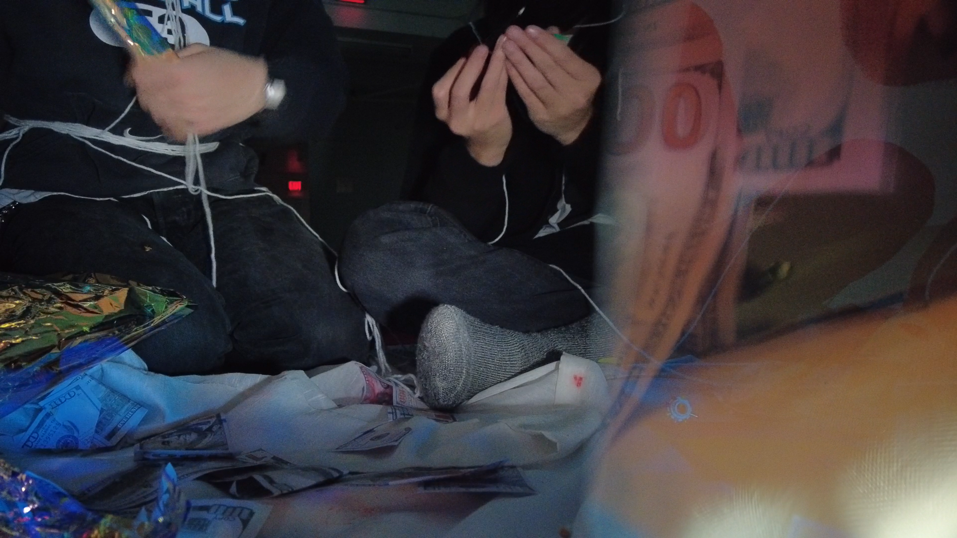 participants putting the pocket camera inside the holographic paper