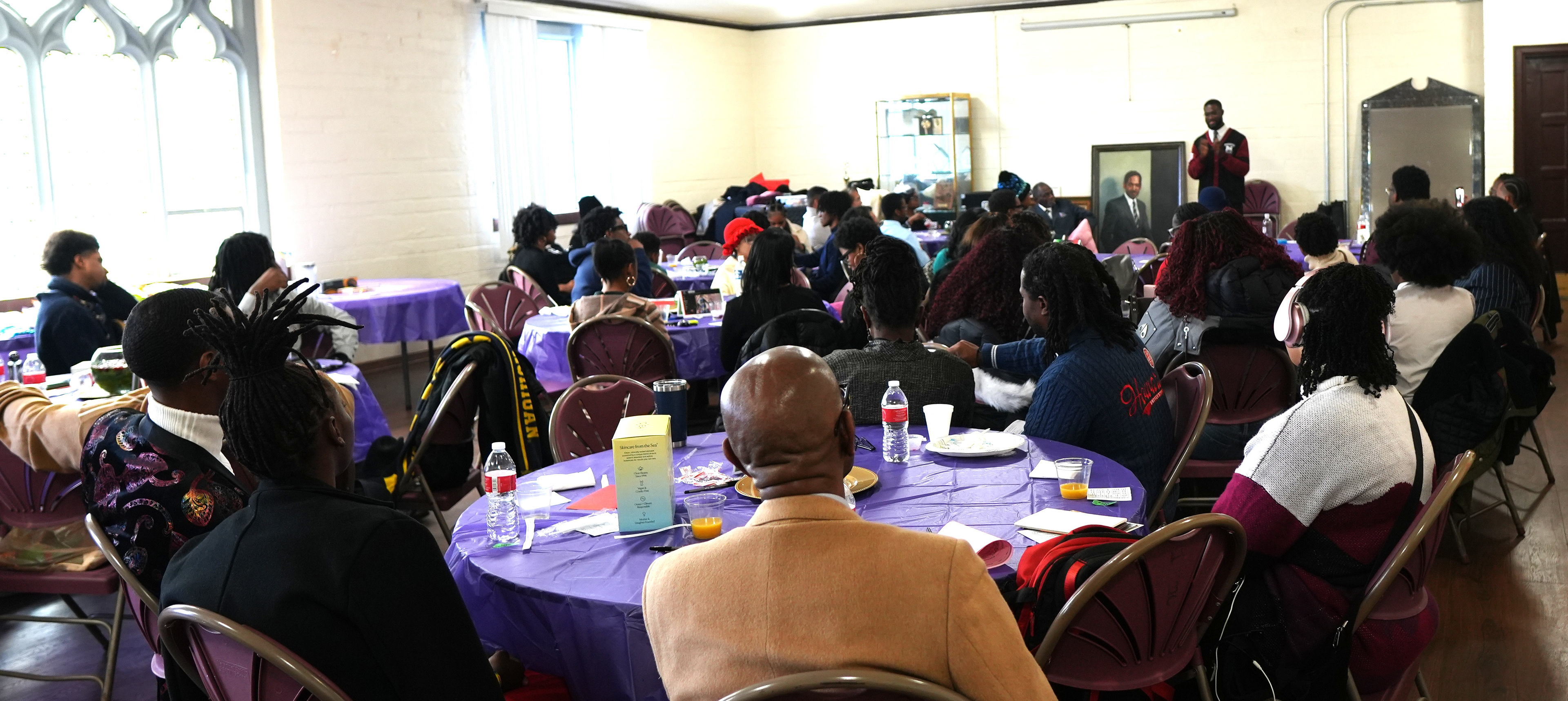 Aniaba speaking to HMBC College Students