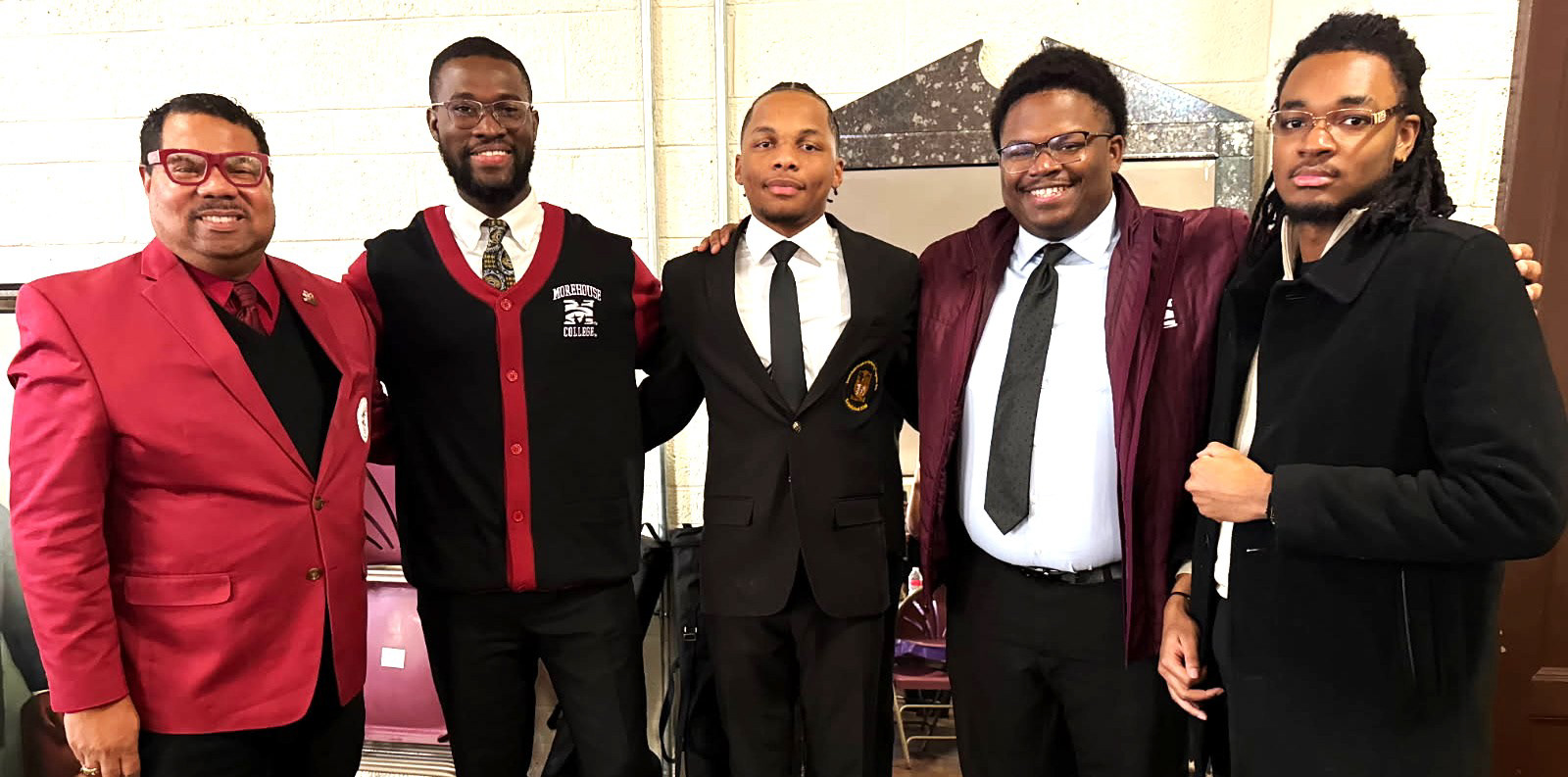 Elijah (middle) admitted student to Morehouse