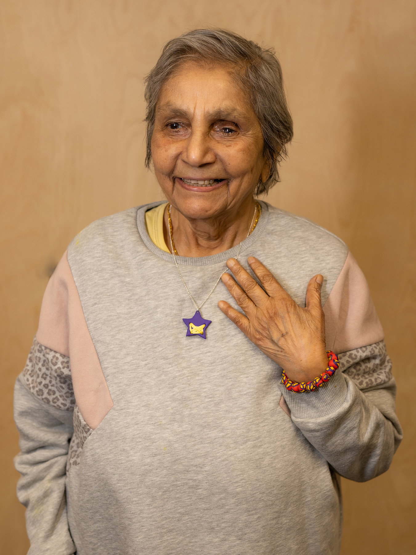Portraits following a craft workshop with newly-made jewellery